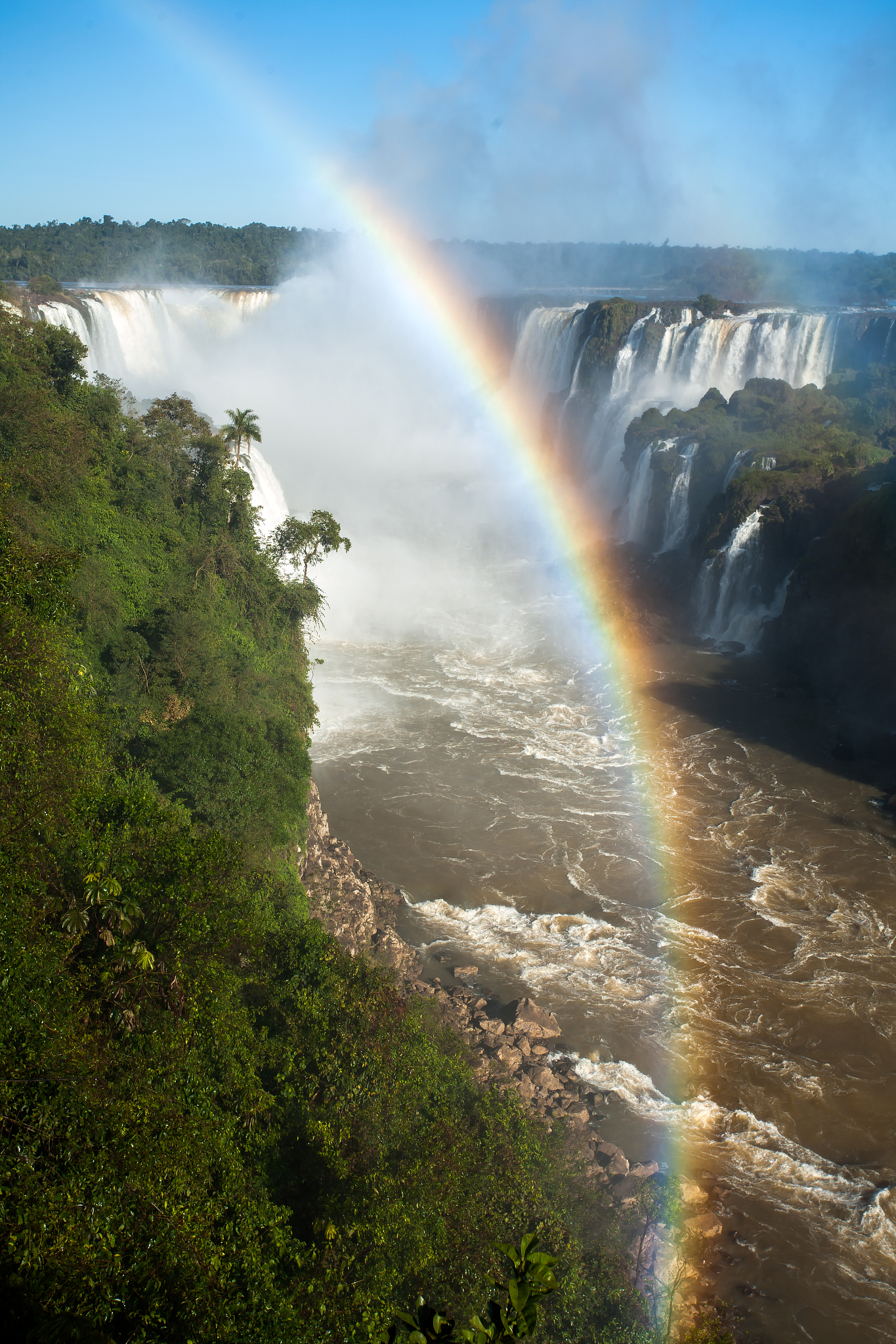 rainbow in iguazu falls national park
