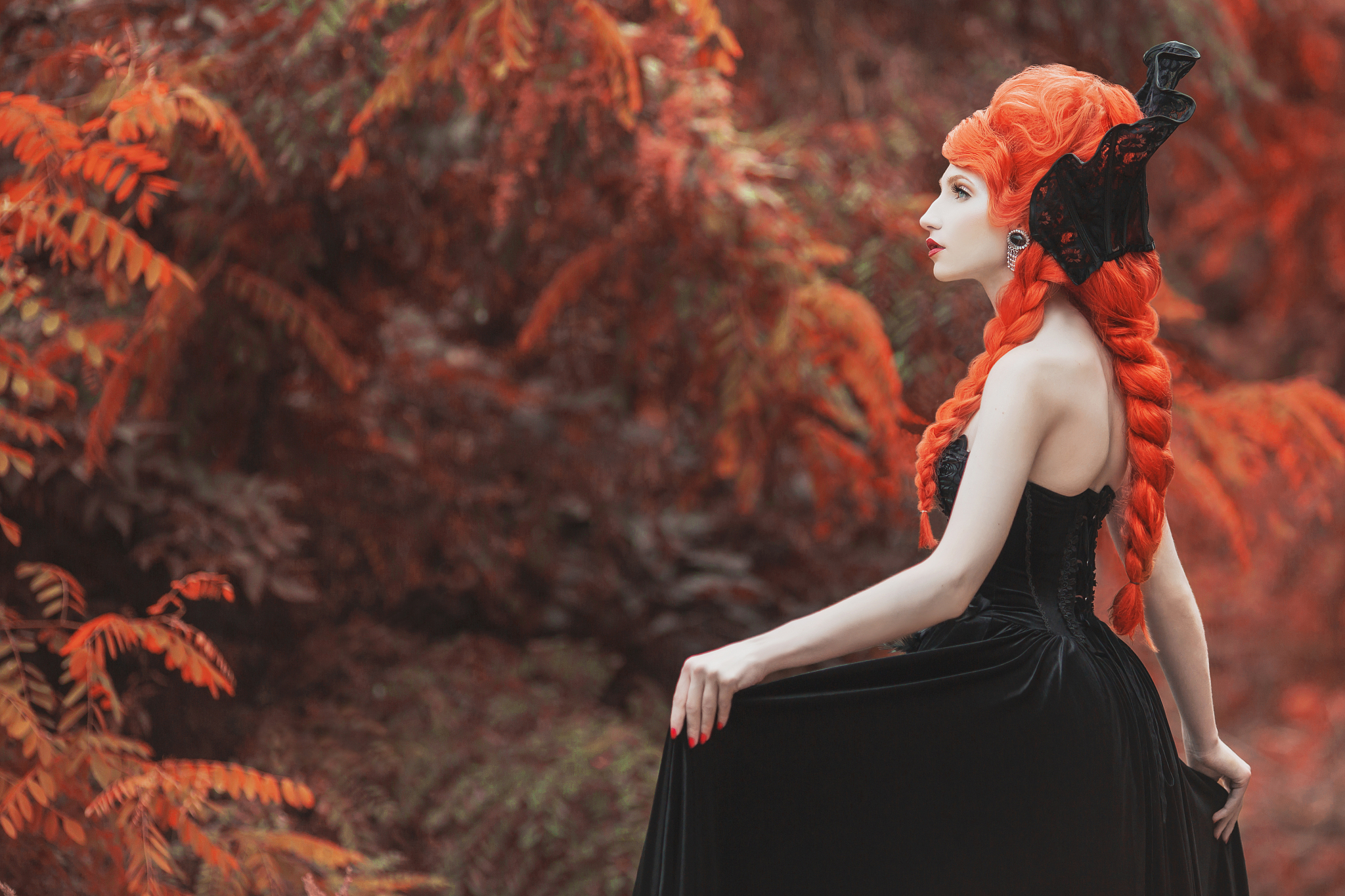 gothic halloween clothes. young edwardian redhead queen with hai