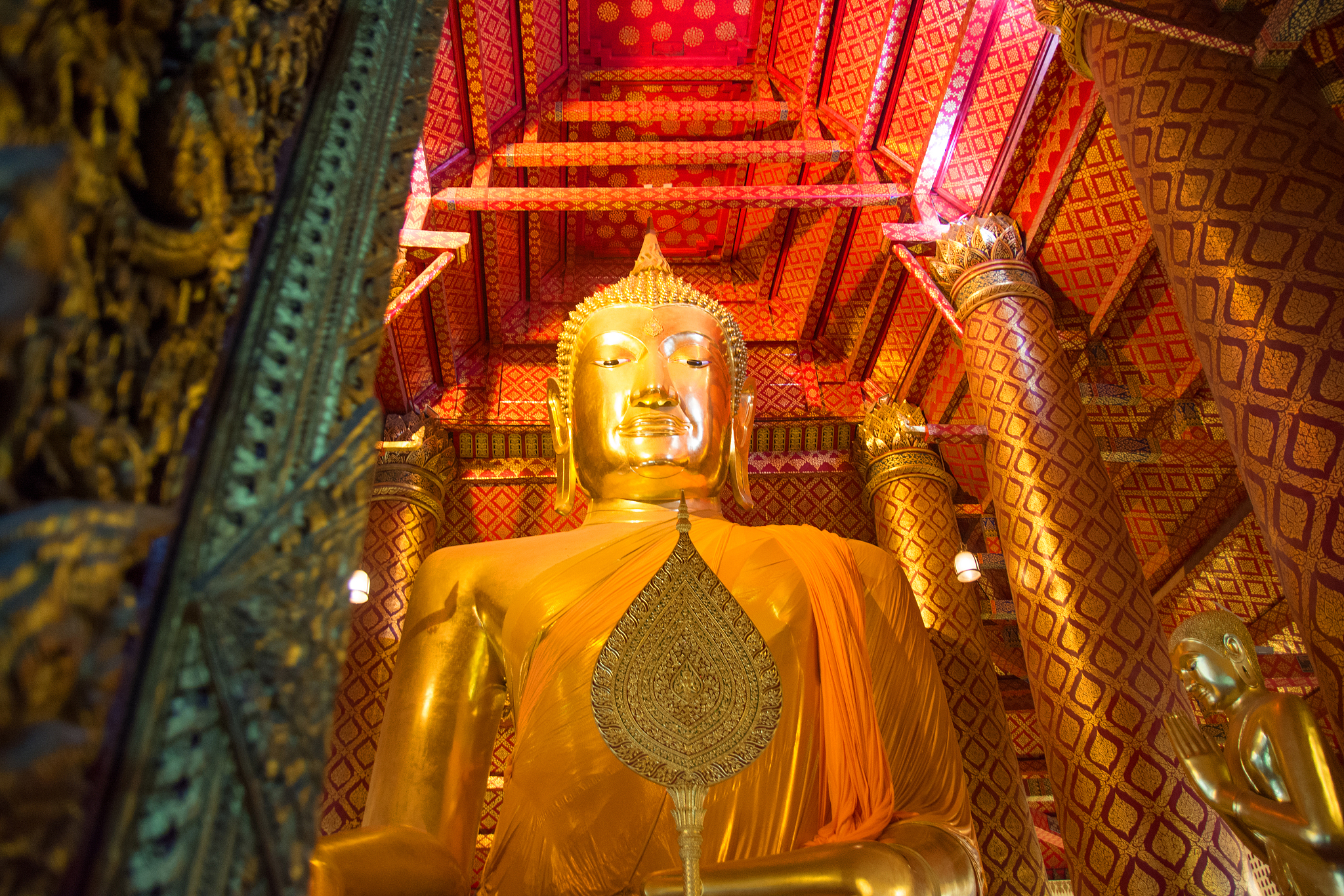 golden statue buddha in temple, thailand