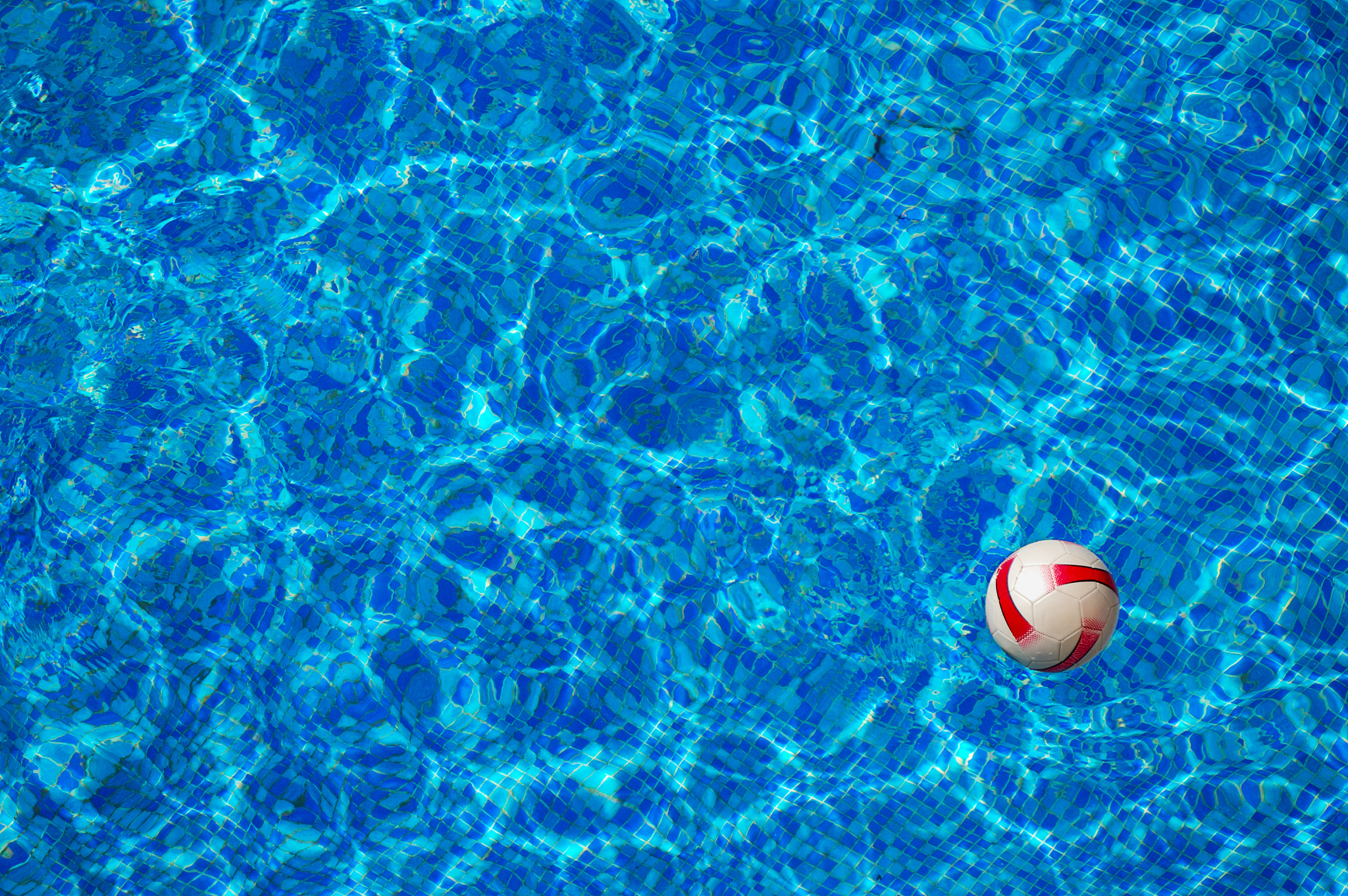 beach ball floating in swimming pool