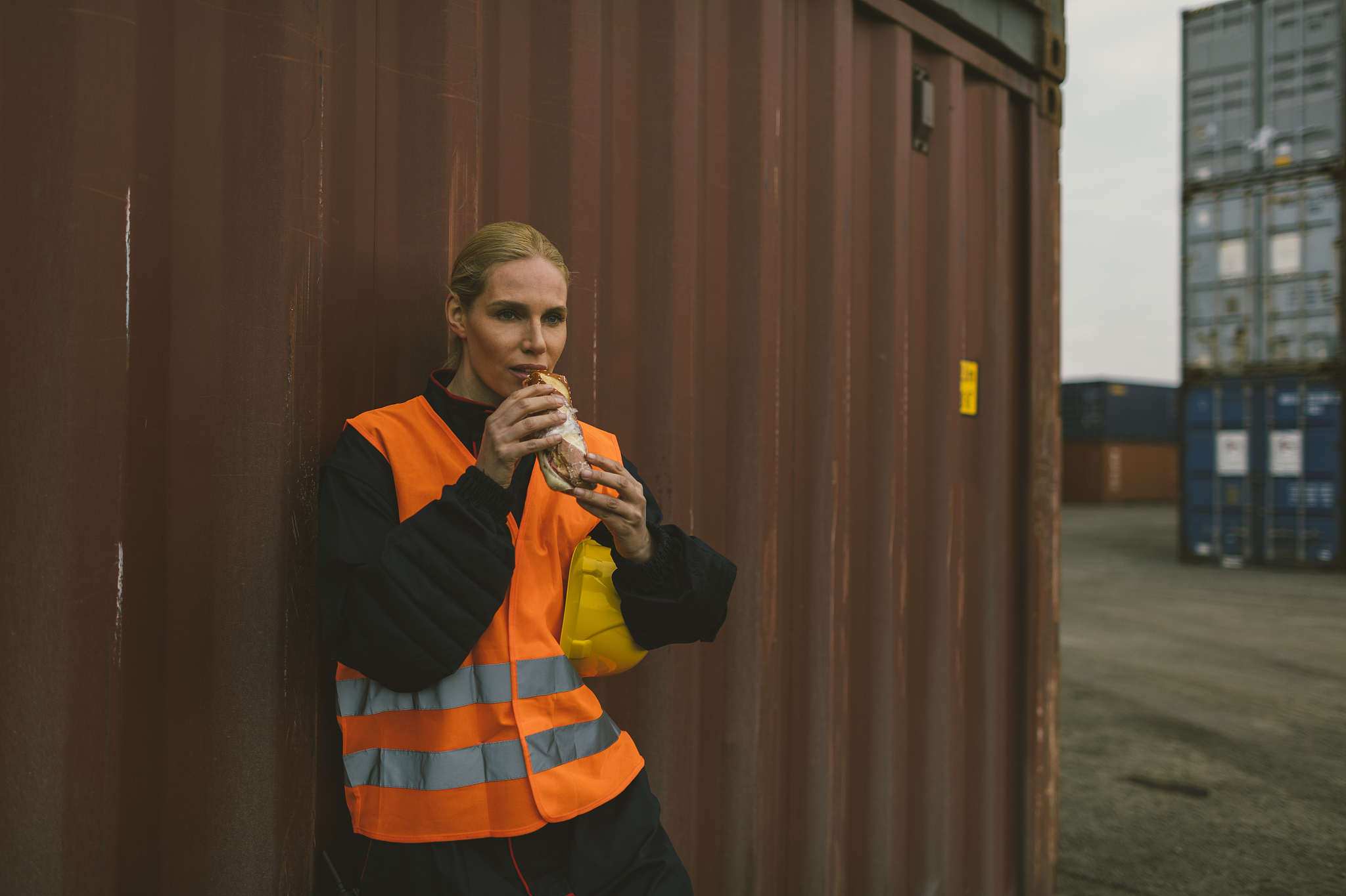 female manual worker on lunch break
