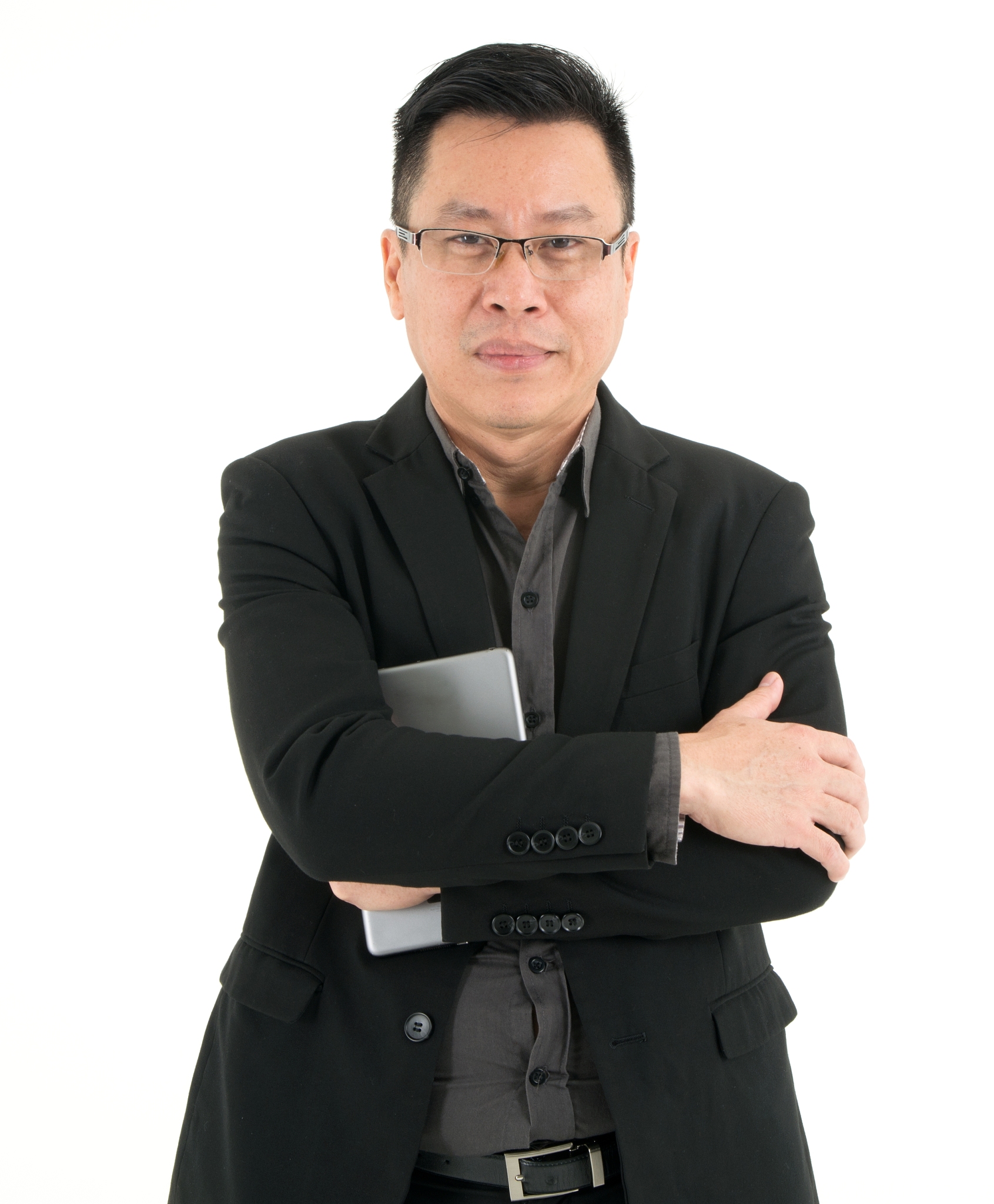 handsome smiling business man in suit standing holding mobile de