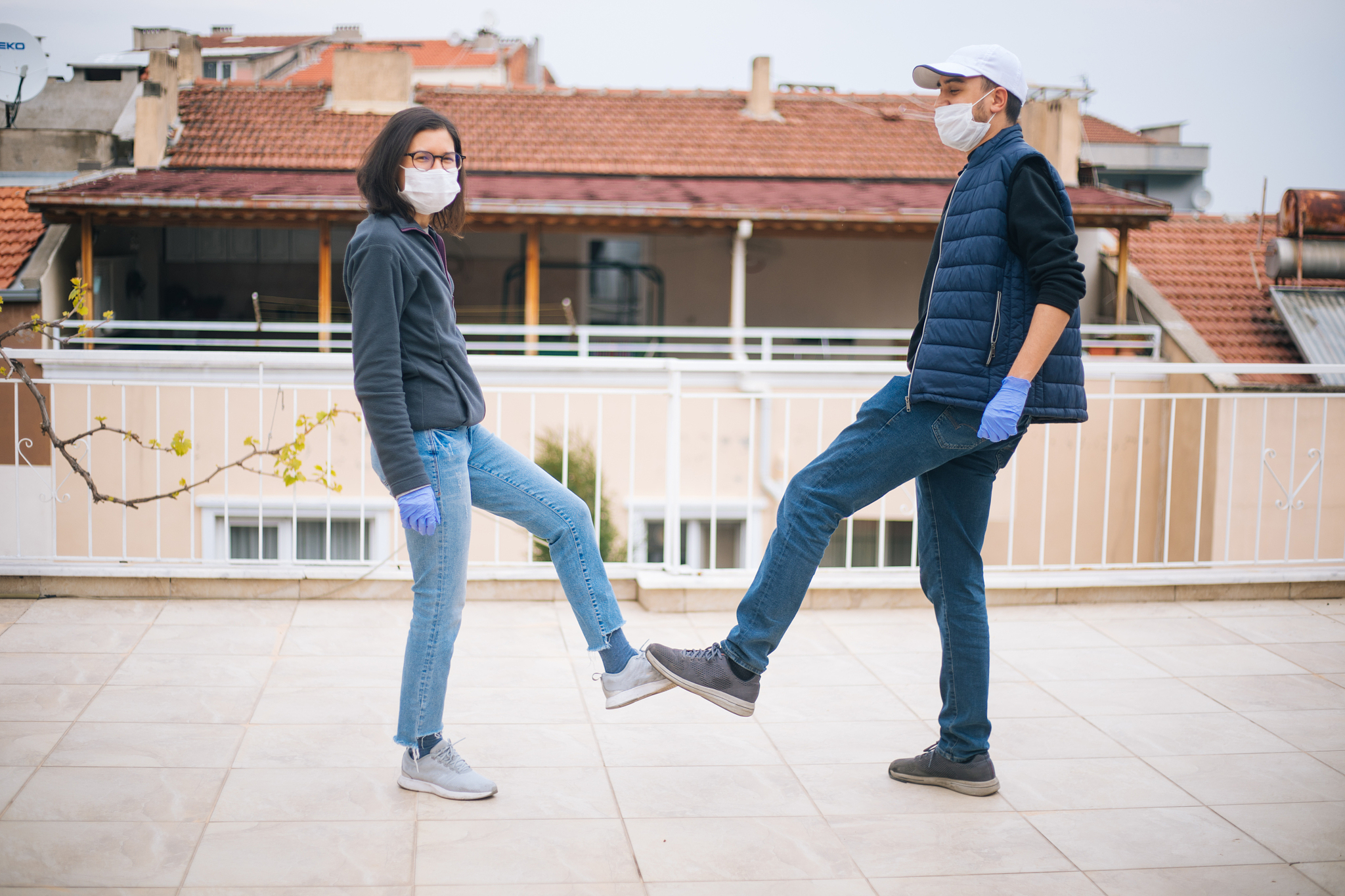 friends greeting during covid-19 pandemic