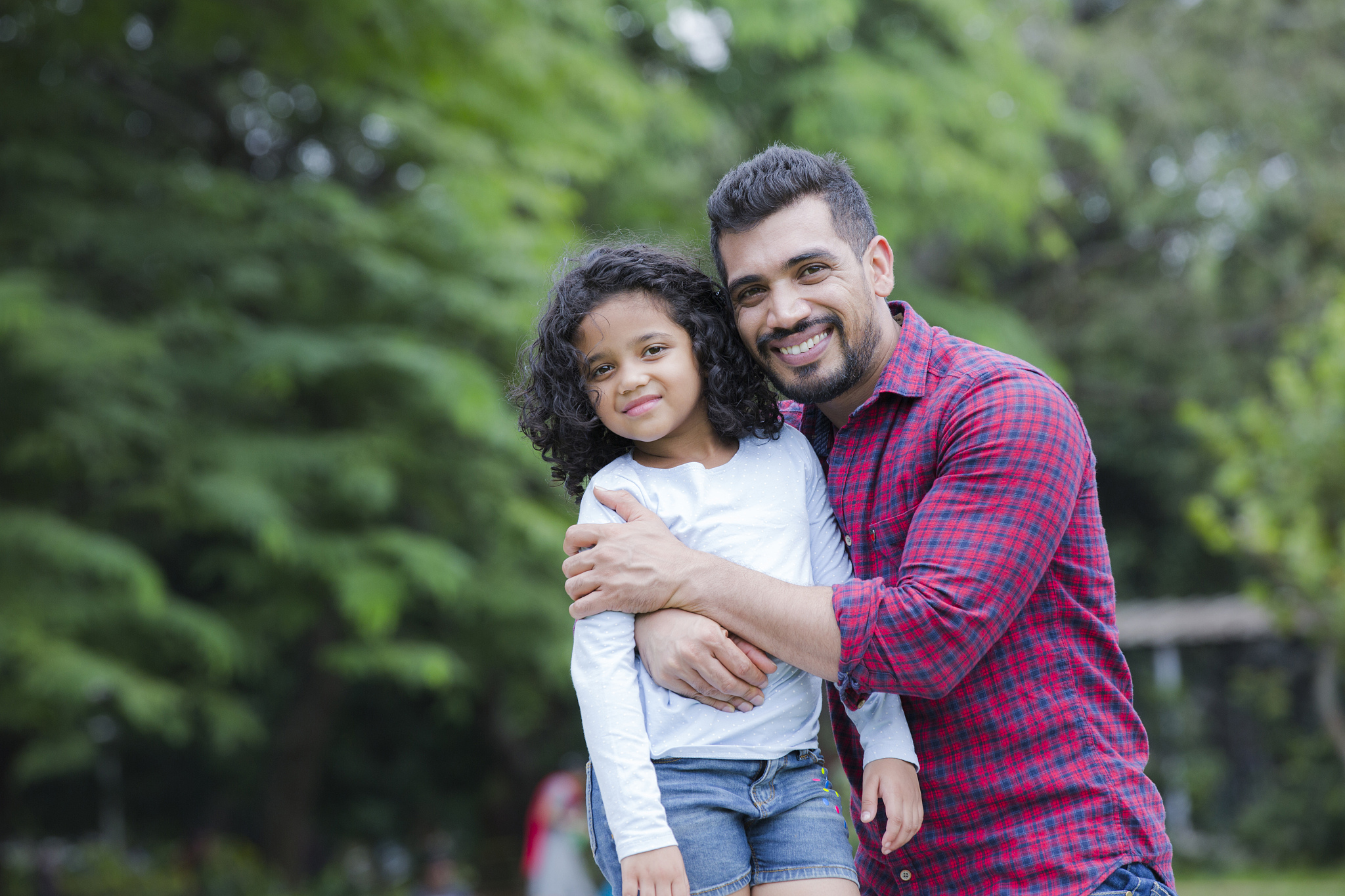 family enjoying summer picnic in the nature stock photo