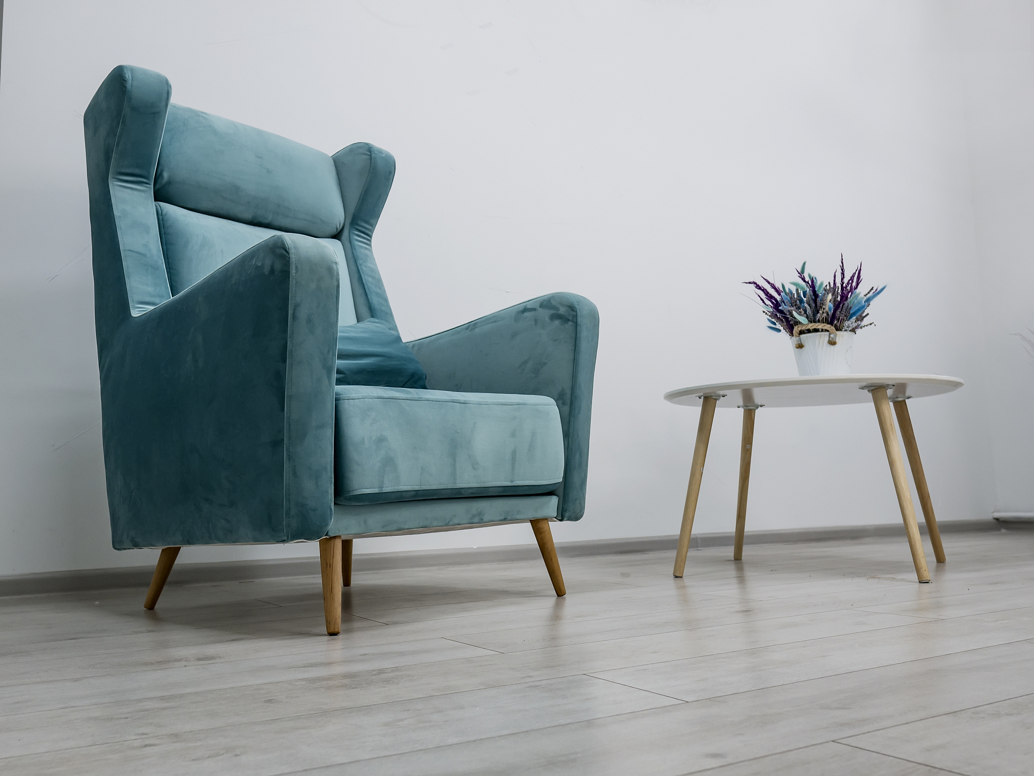 elegant green armchair and coffee table