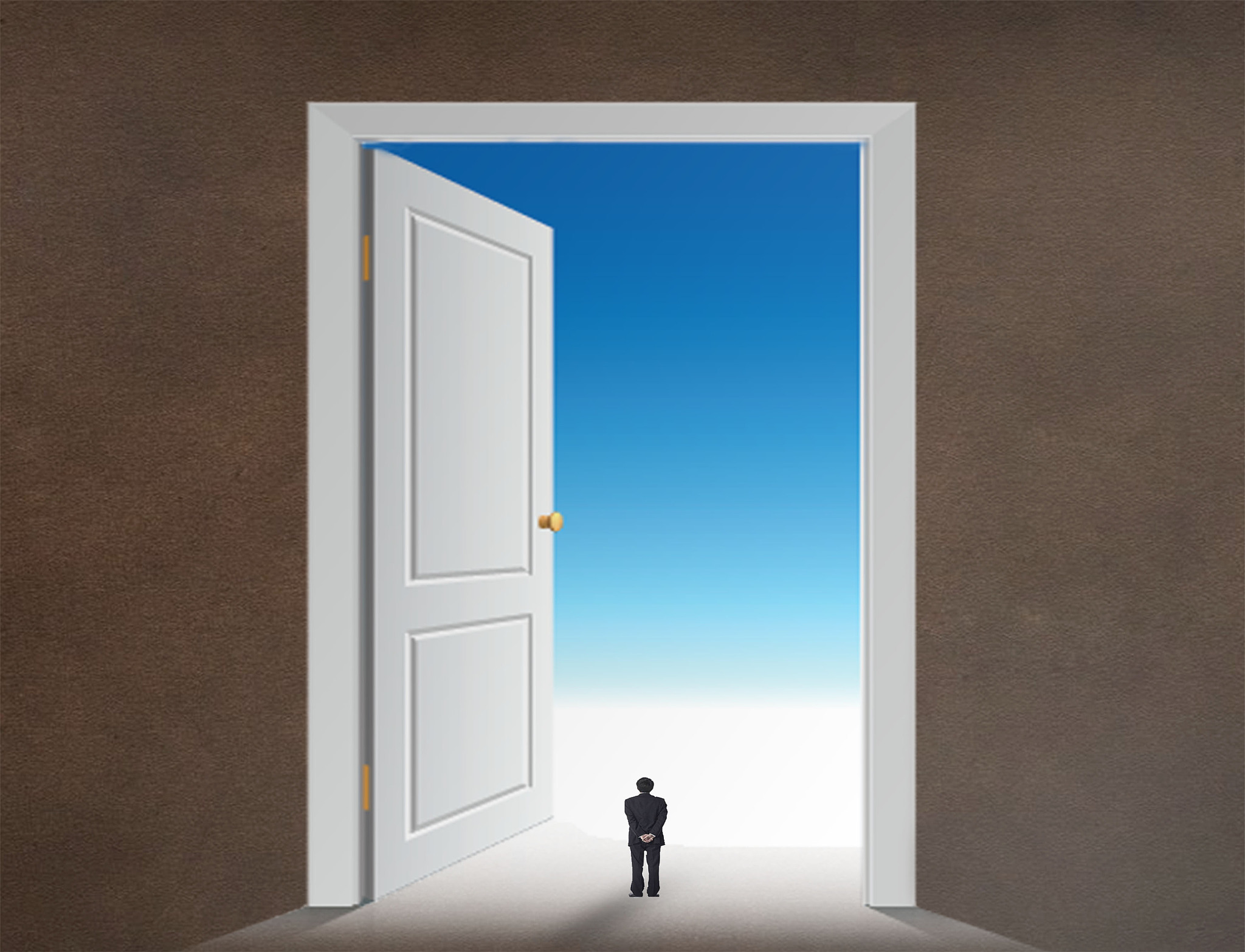 business man looking at big bright opened door stock photo