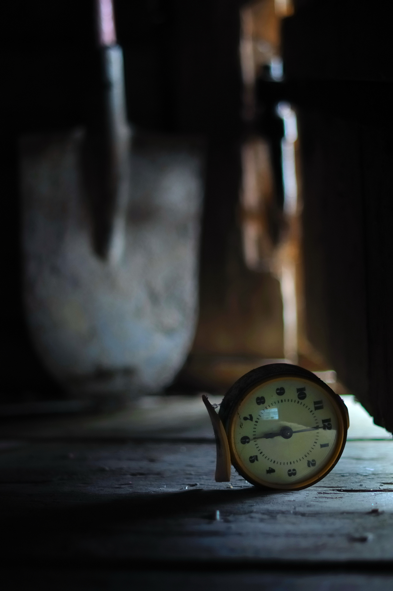 old clock and a shovel