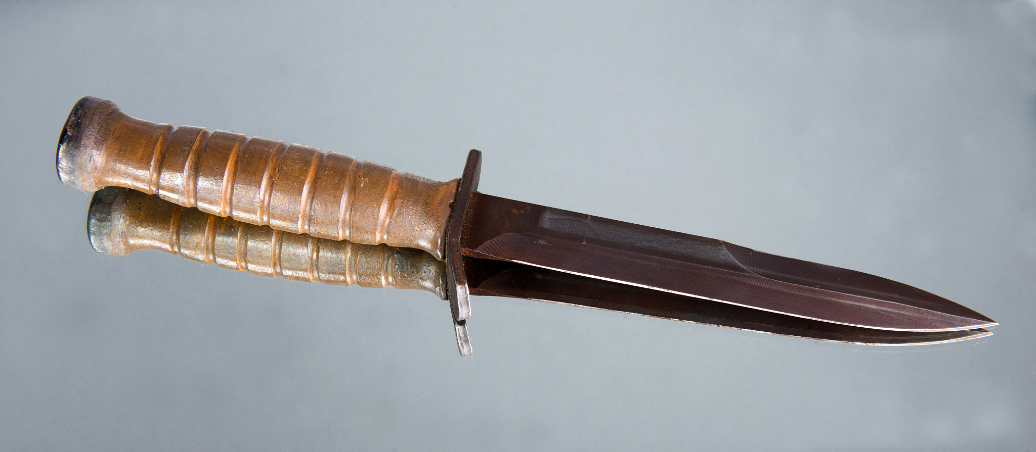 dagger with a reflection