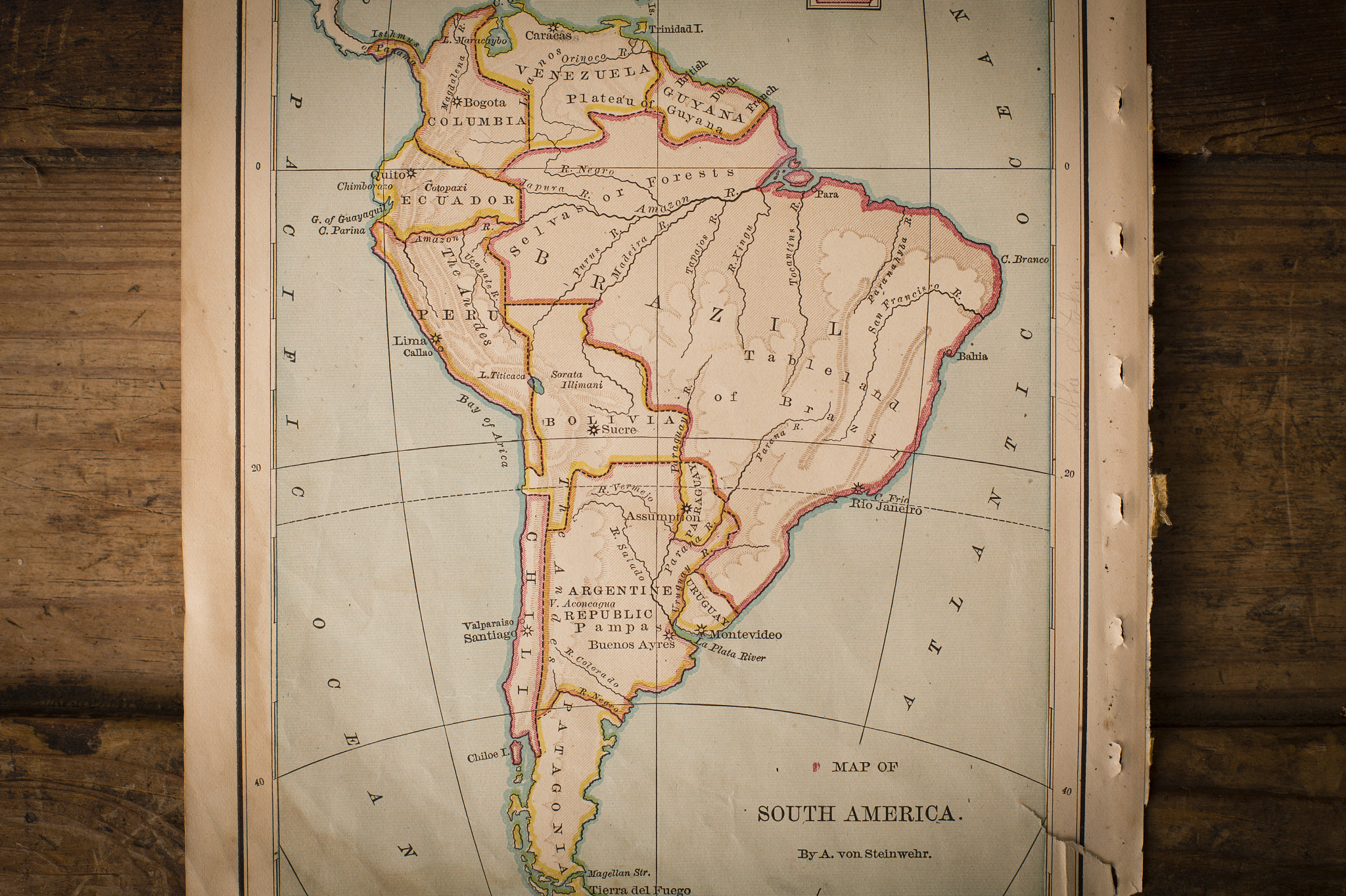 old color map of south america, from 1800's, on wood