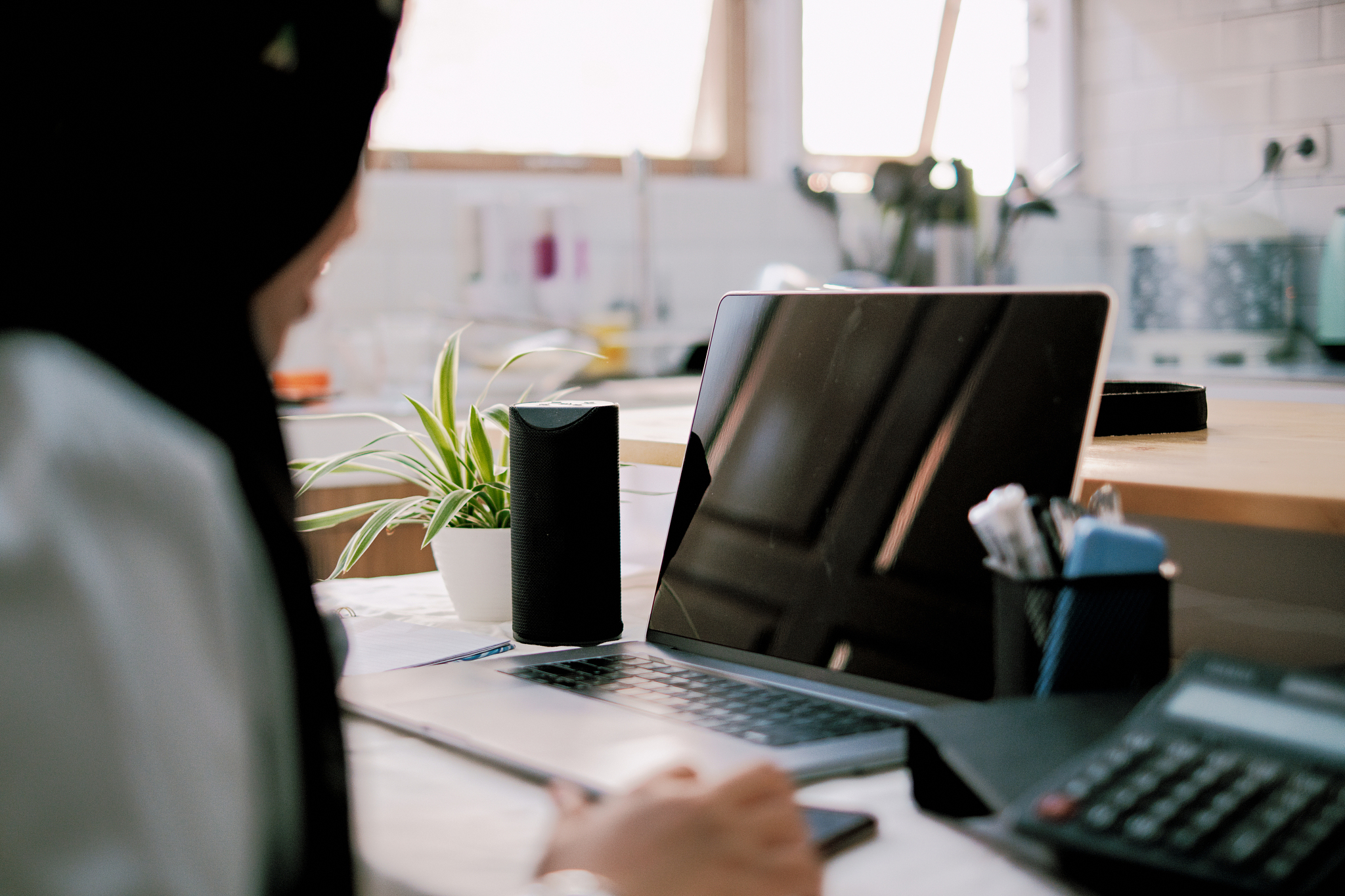 young asian man working from home