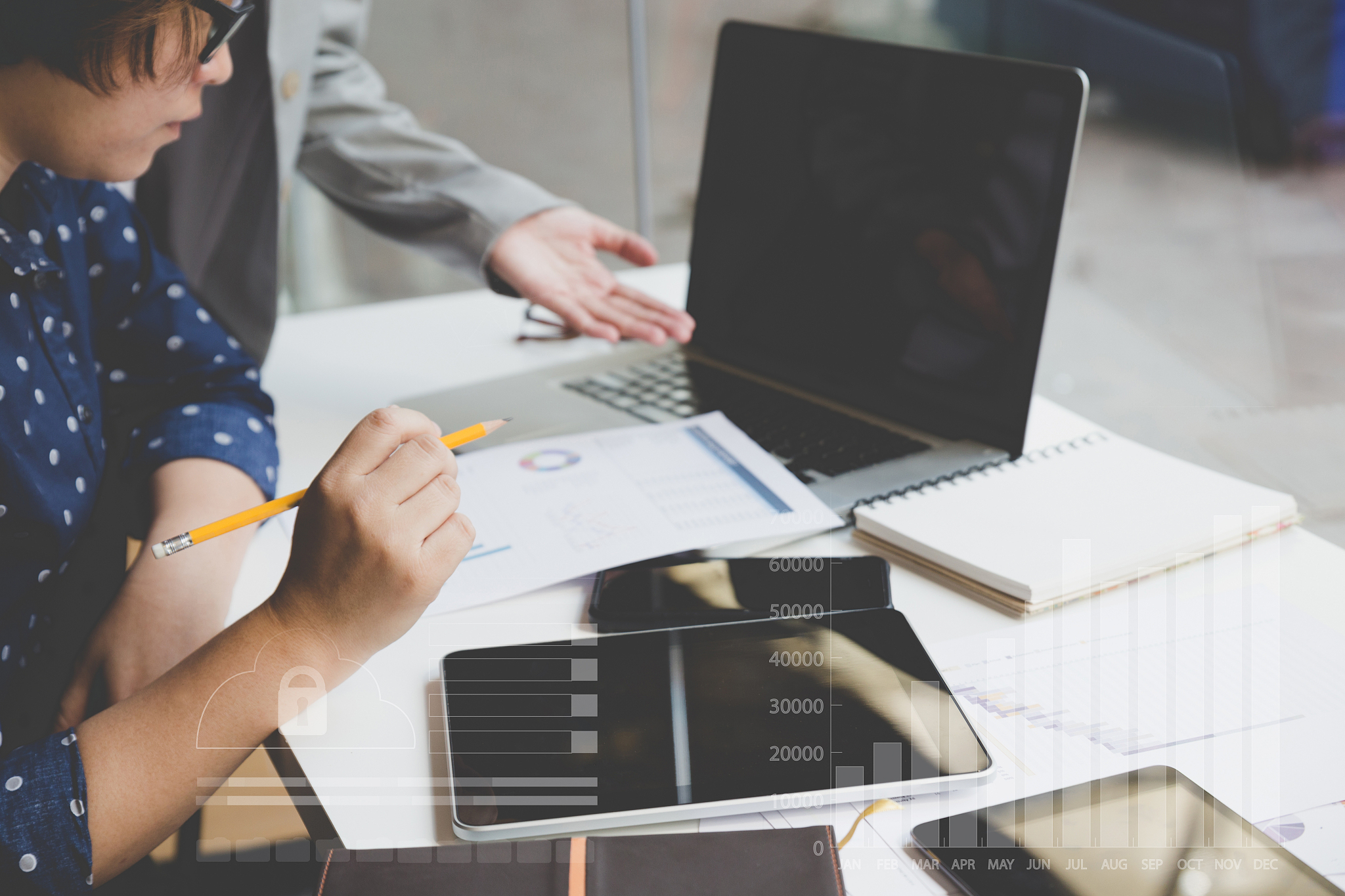 businesspeople working with document and computer in office work