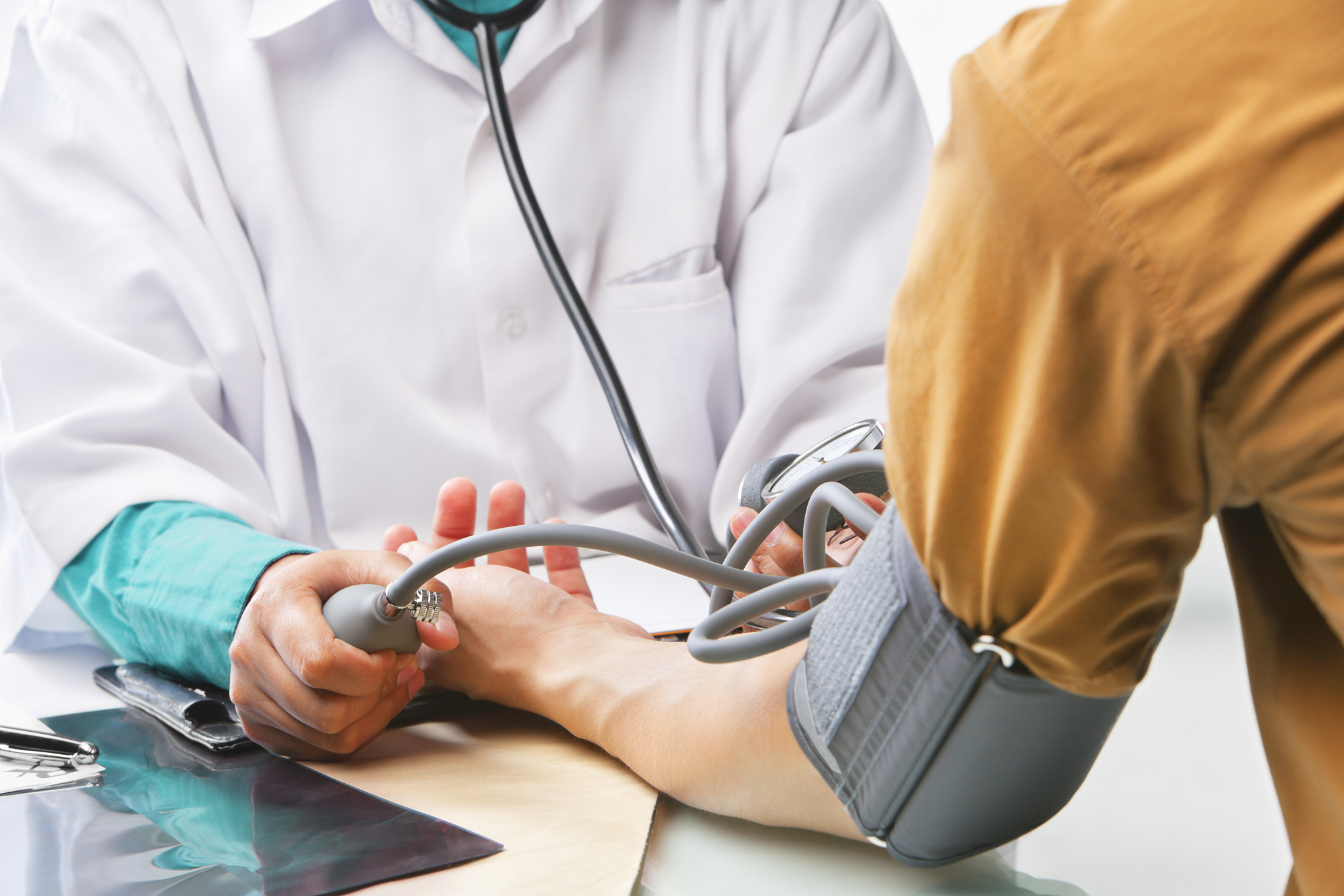 checking blood pressure