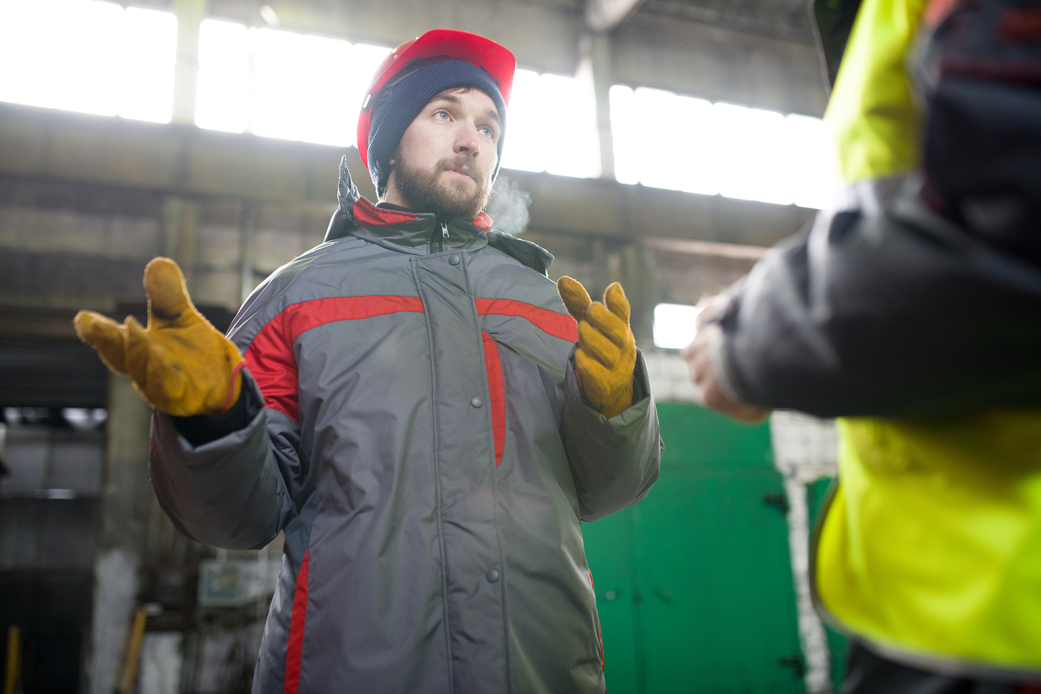 young worker at industrial plant