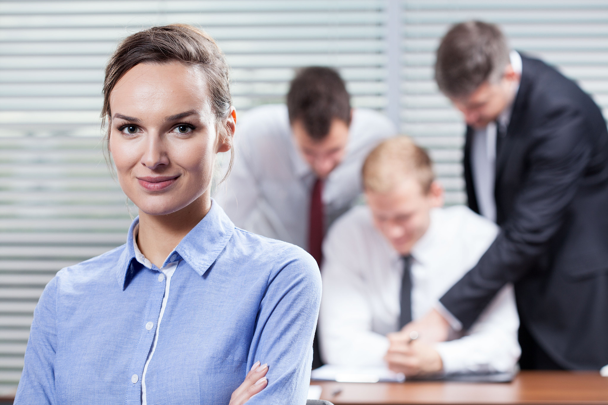 businesswoman and her co-workers