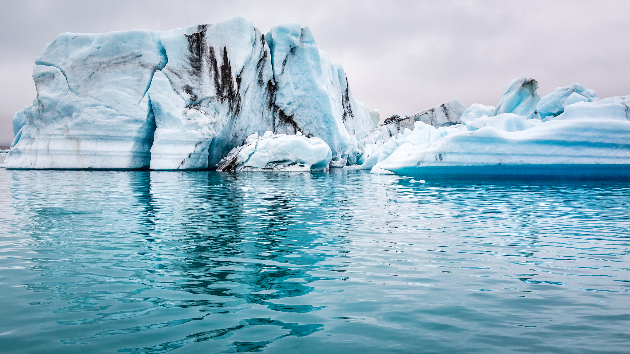 blue icebergs floating on the lake, iceland