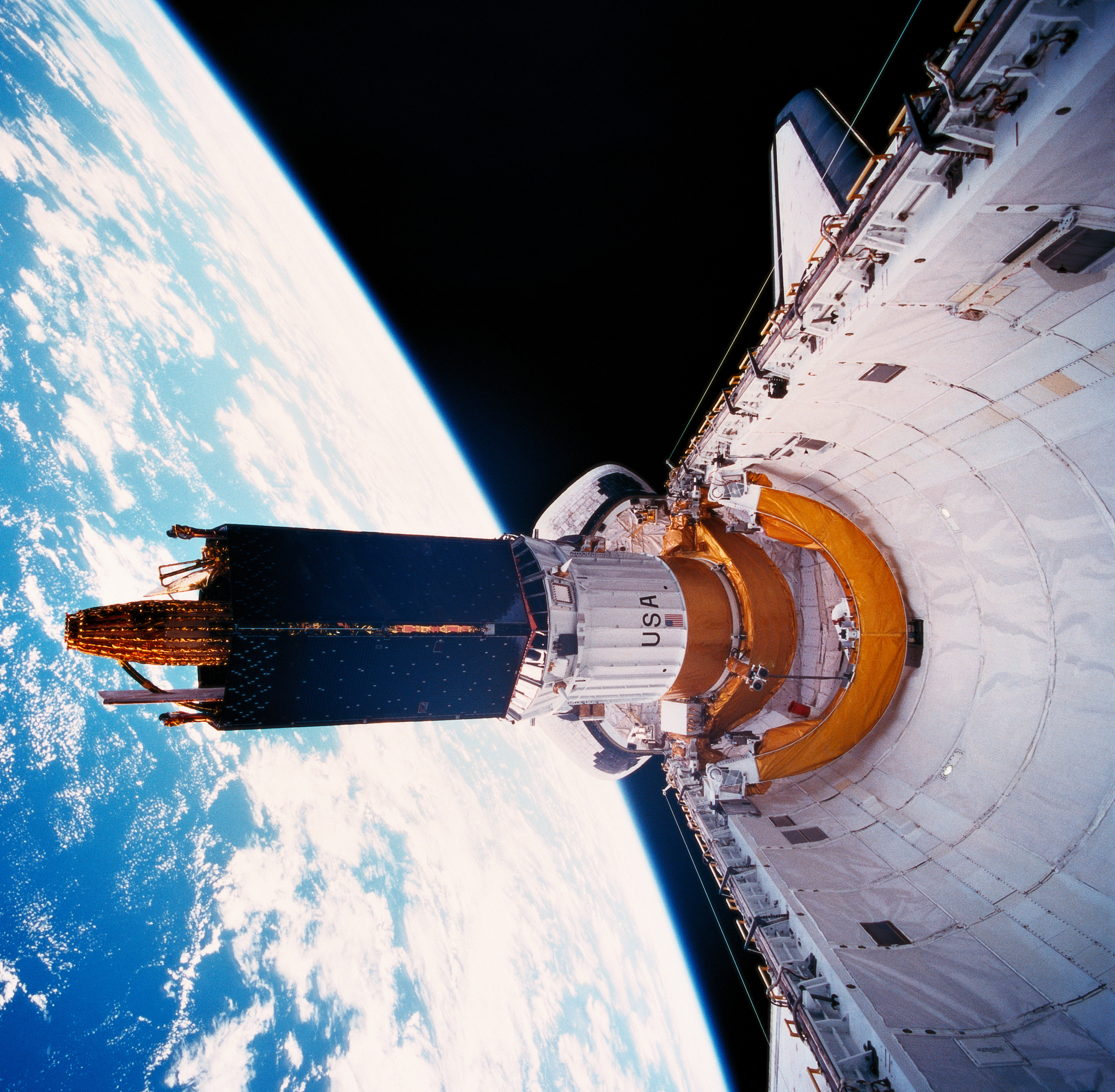the space shuttle in orbit with its cargo bay open