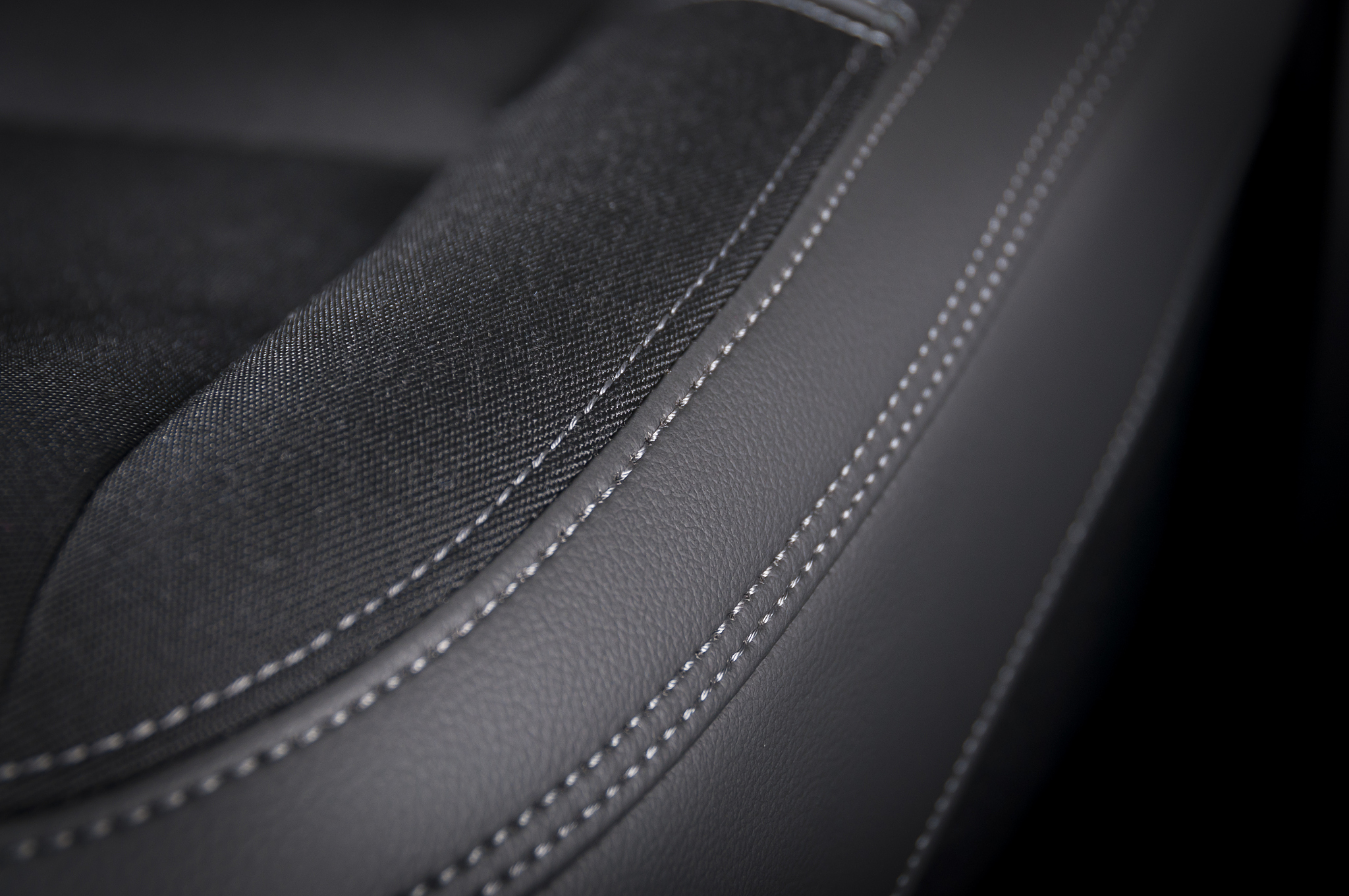 leather car seats  detail with focus on stitch