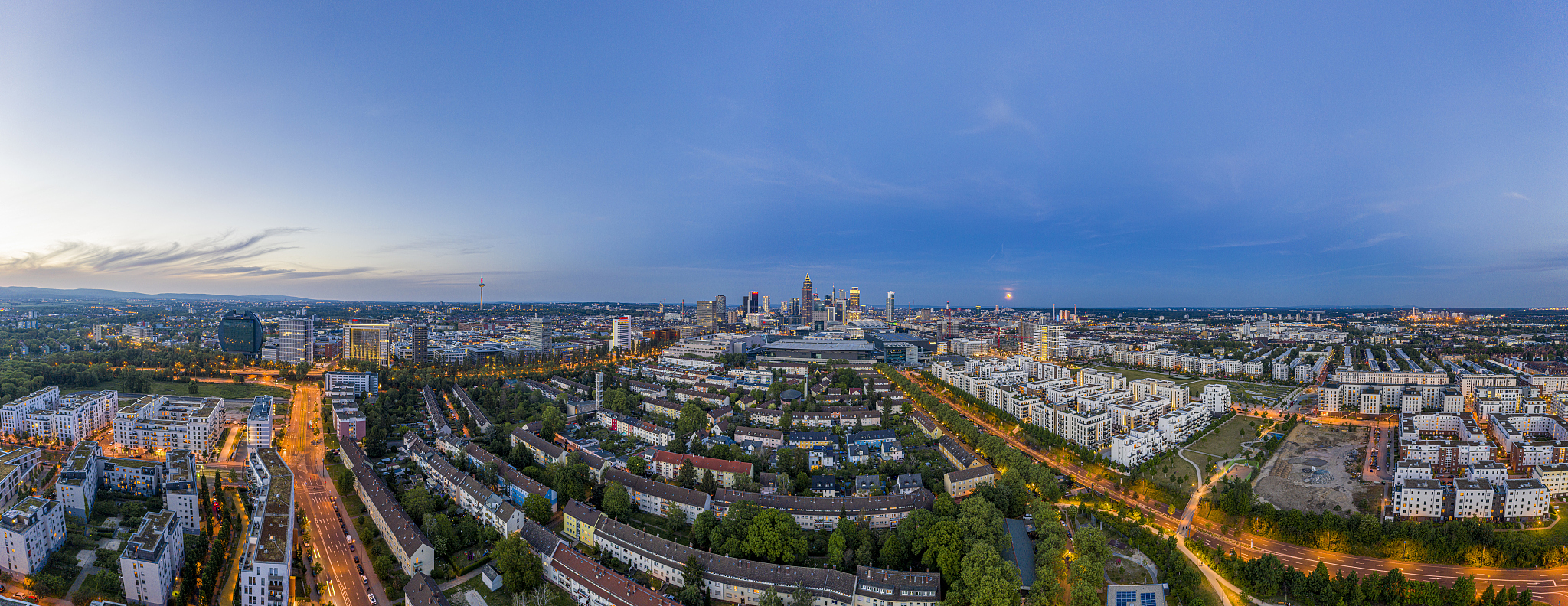aerial drone panorama of frankfurt skyline during sunset