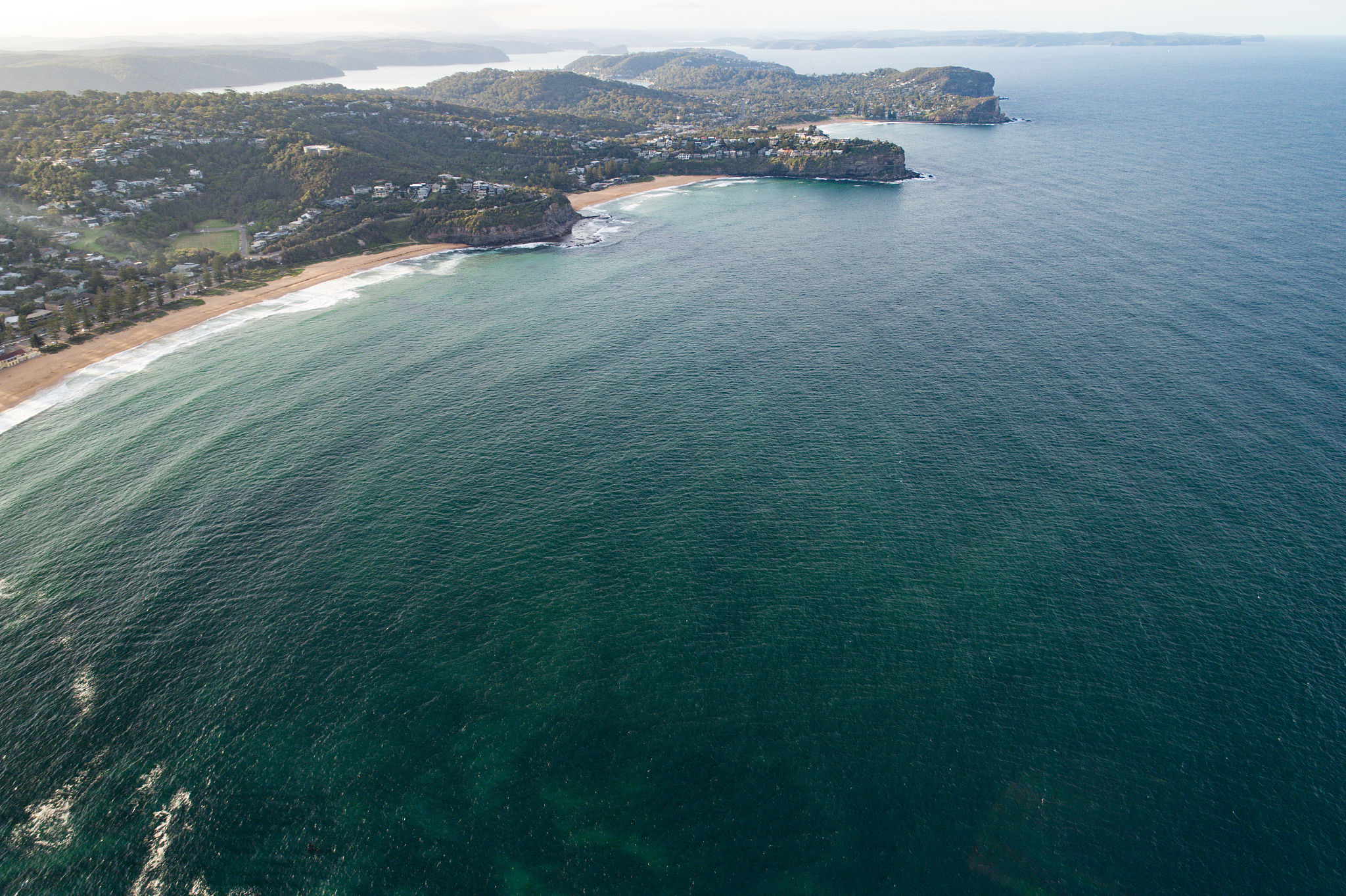 waves on an australian beach aerial