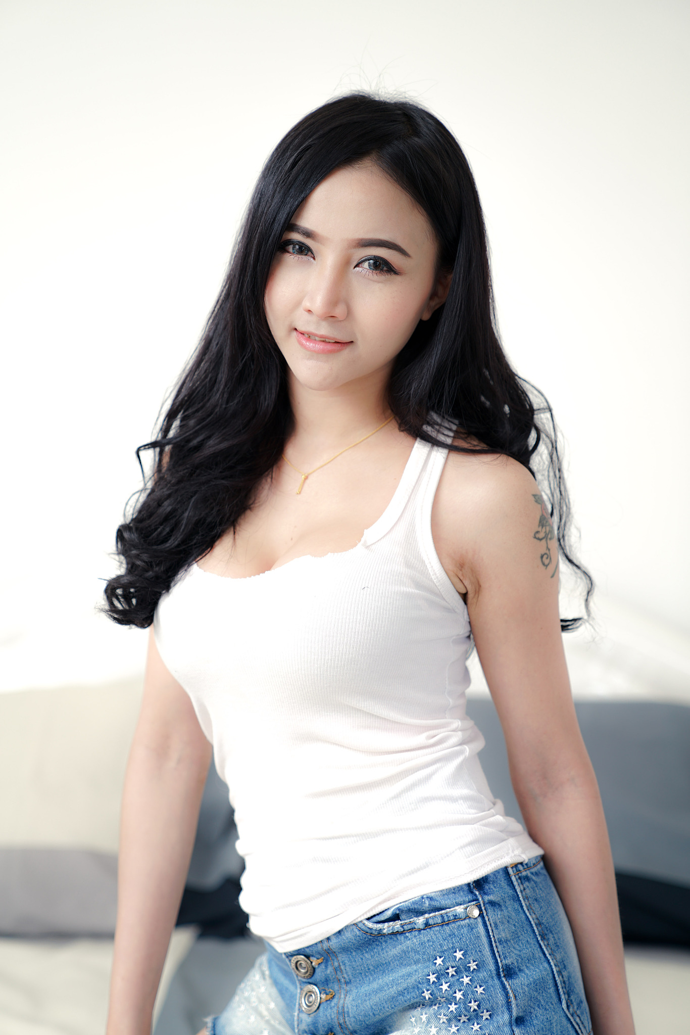 asian young sexy lady black long hair in white vest