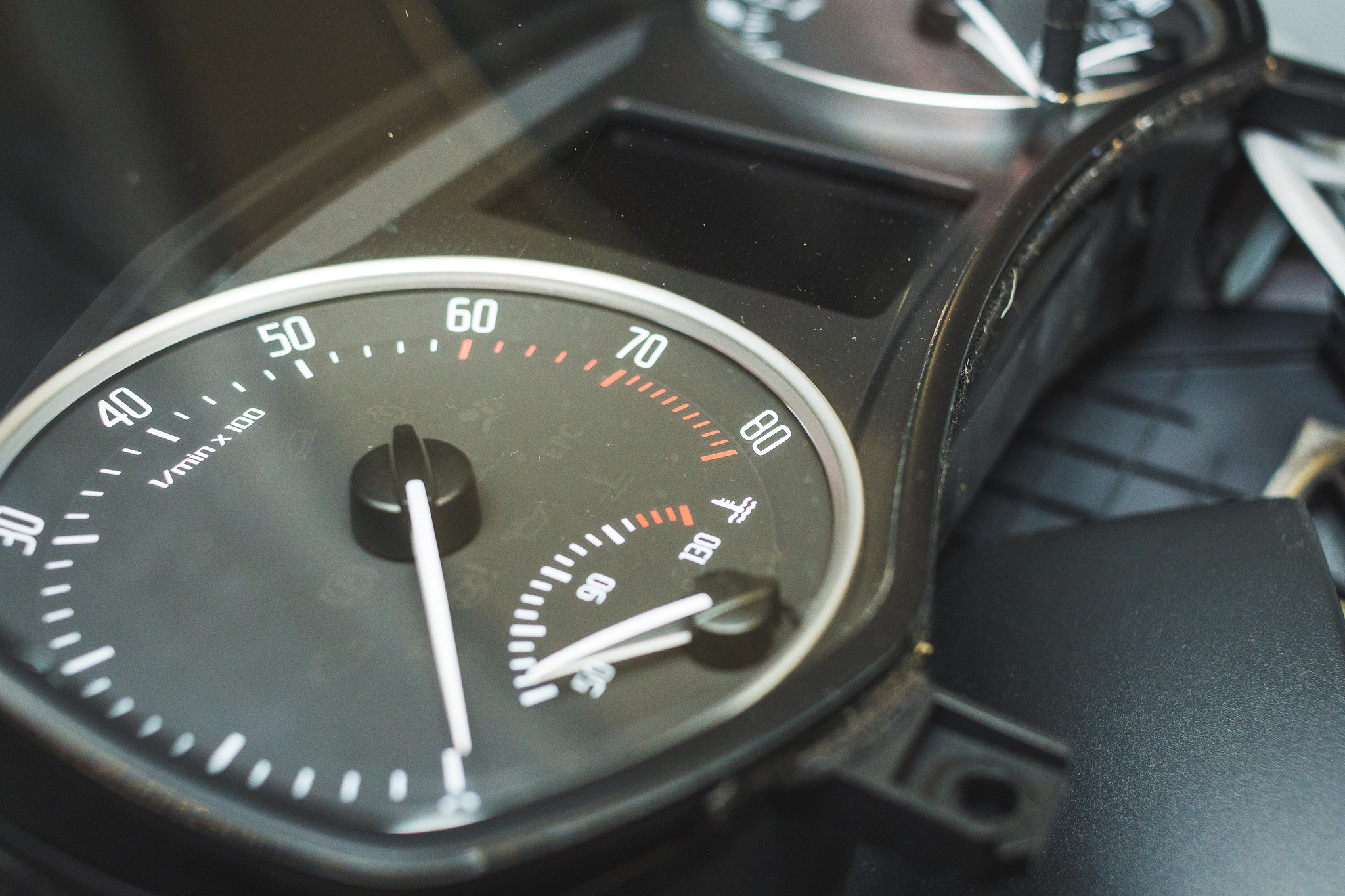 crop shot of a dismantled round car dashboard