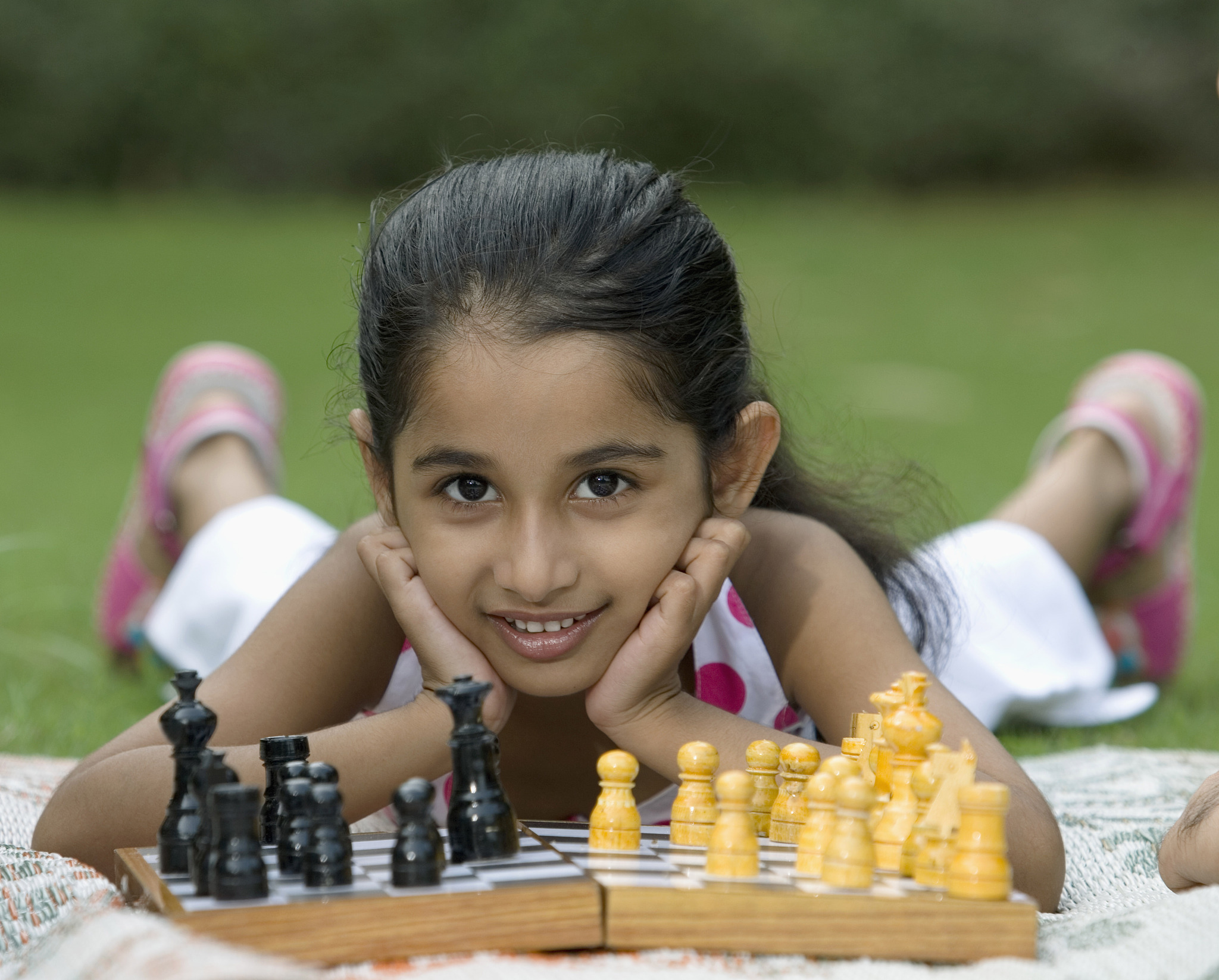 girl playing chess