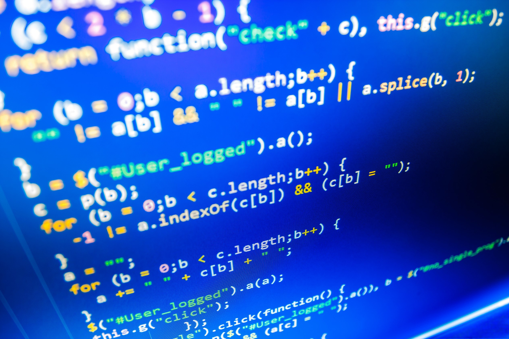 software developer programming code on computer