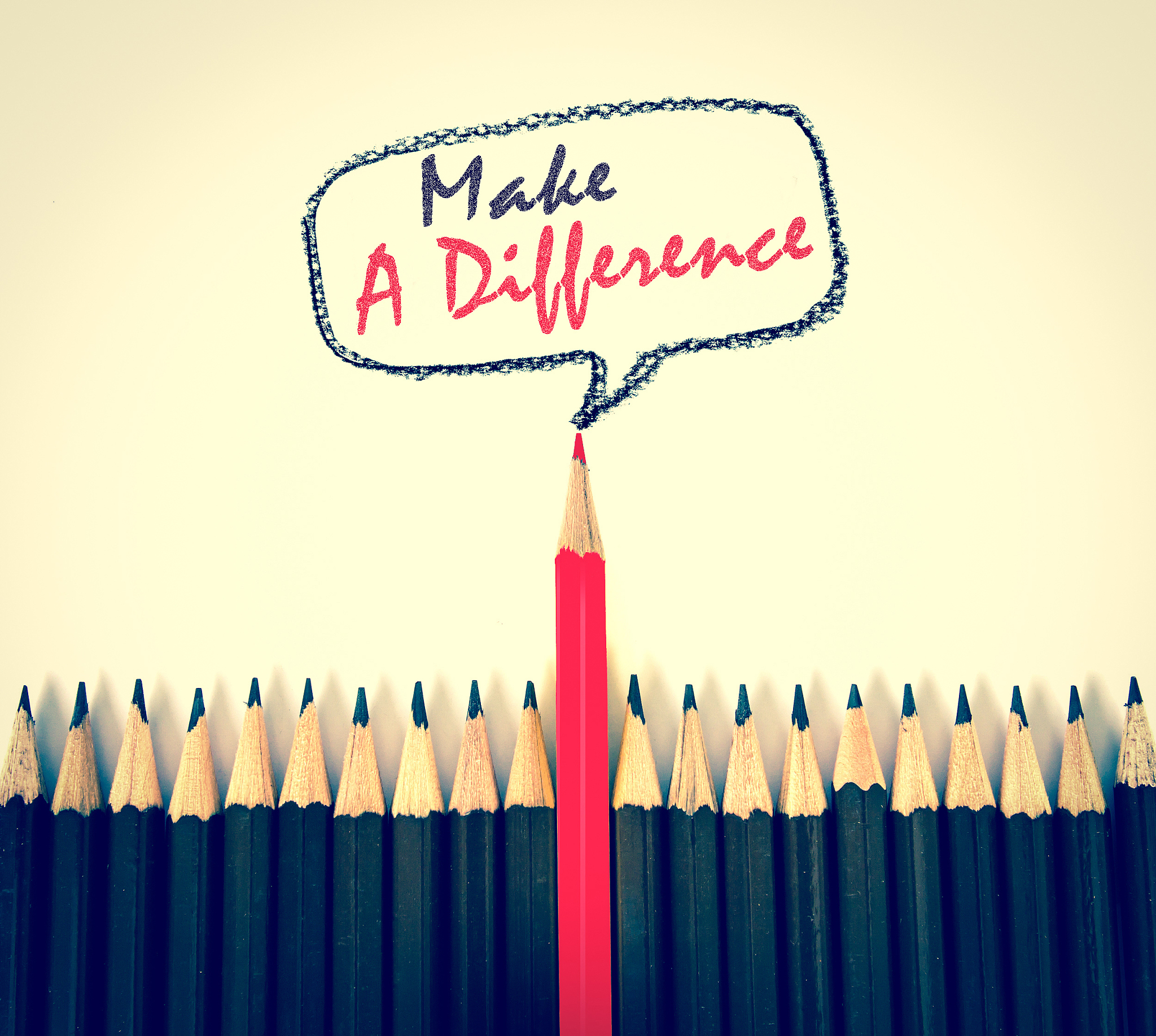 red wooden pencil arrange  with make a difference concept