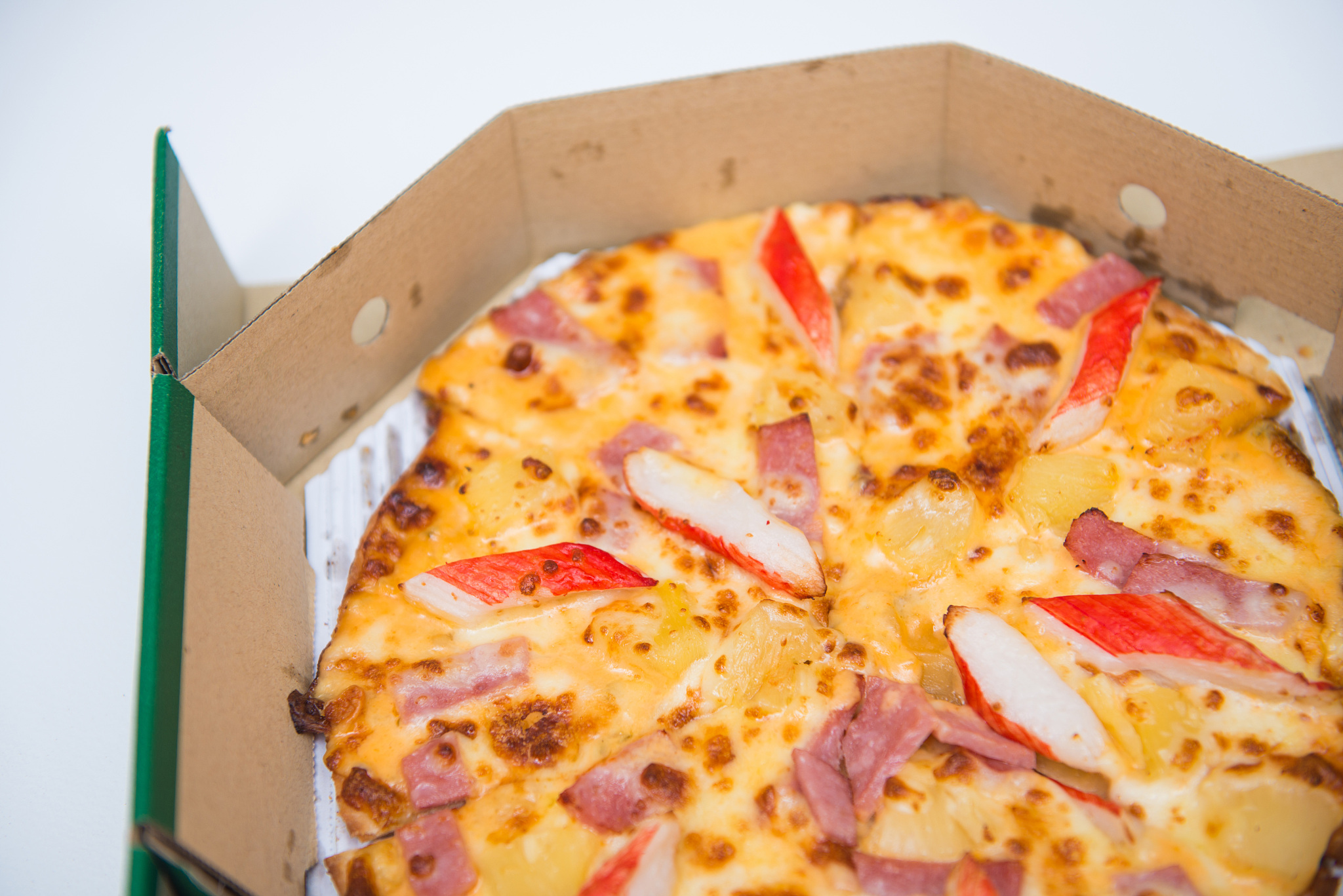 delicious homemade pizza in paper box