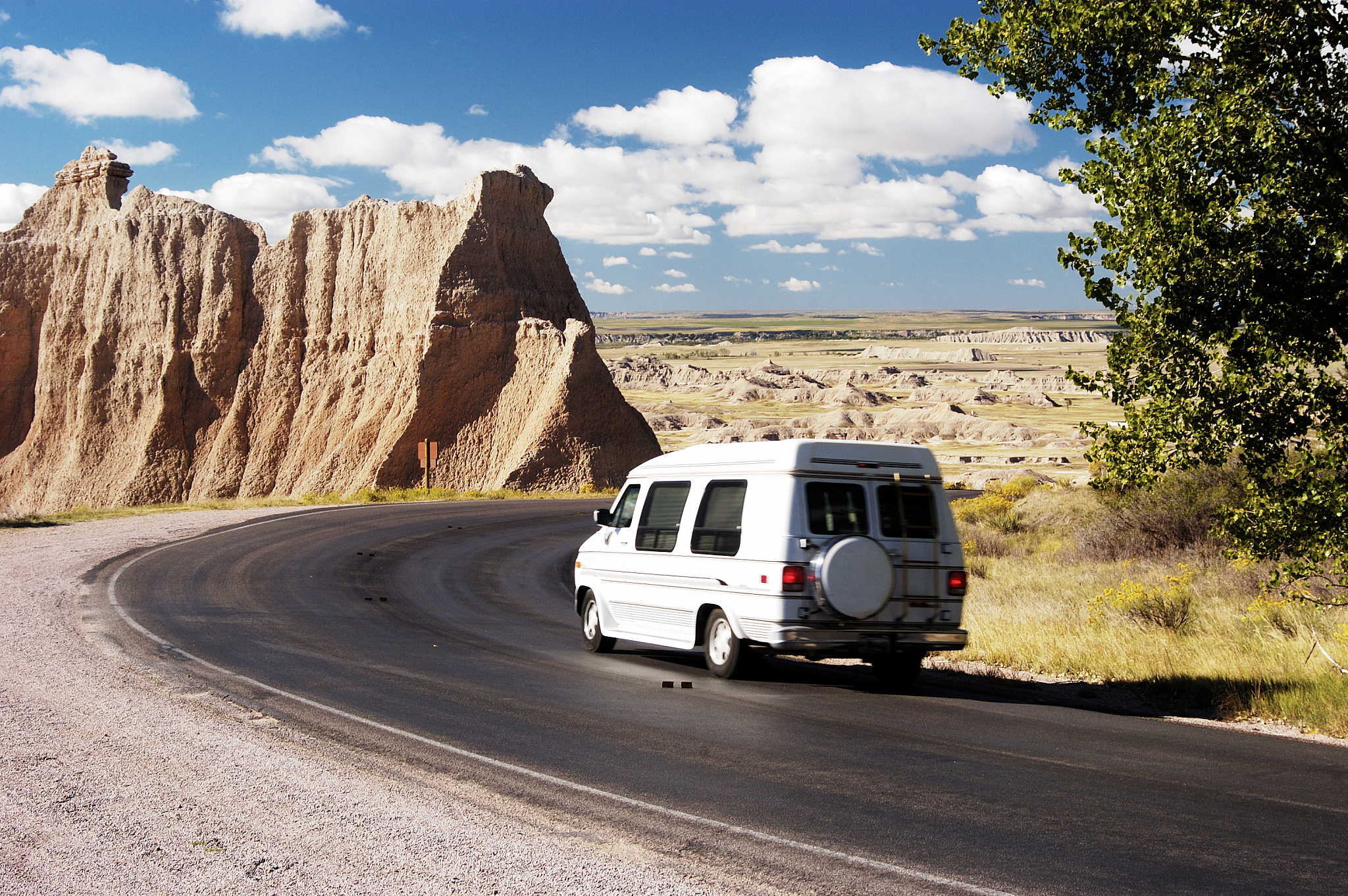 Adventure Awaits: Travel Van Speeding Down the Highway