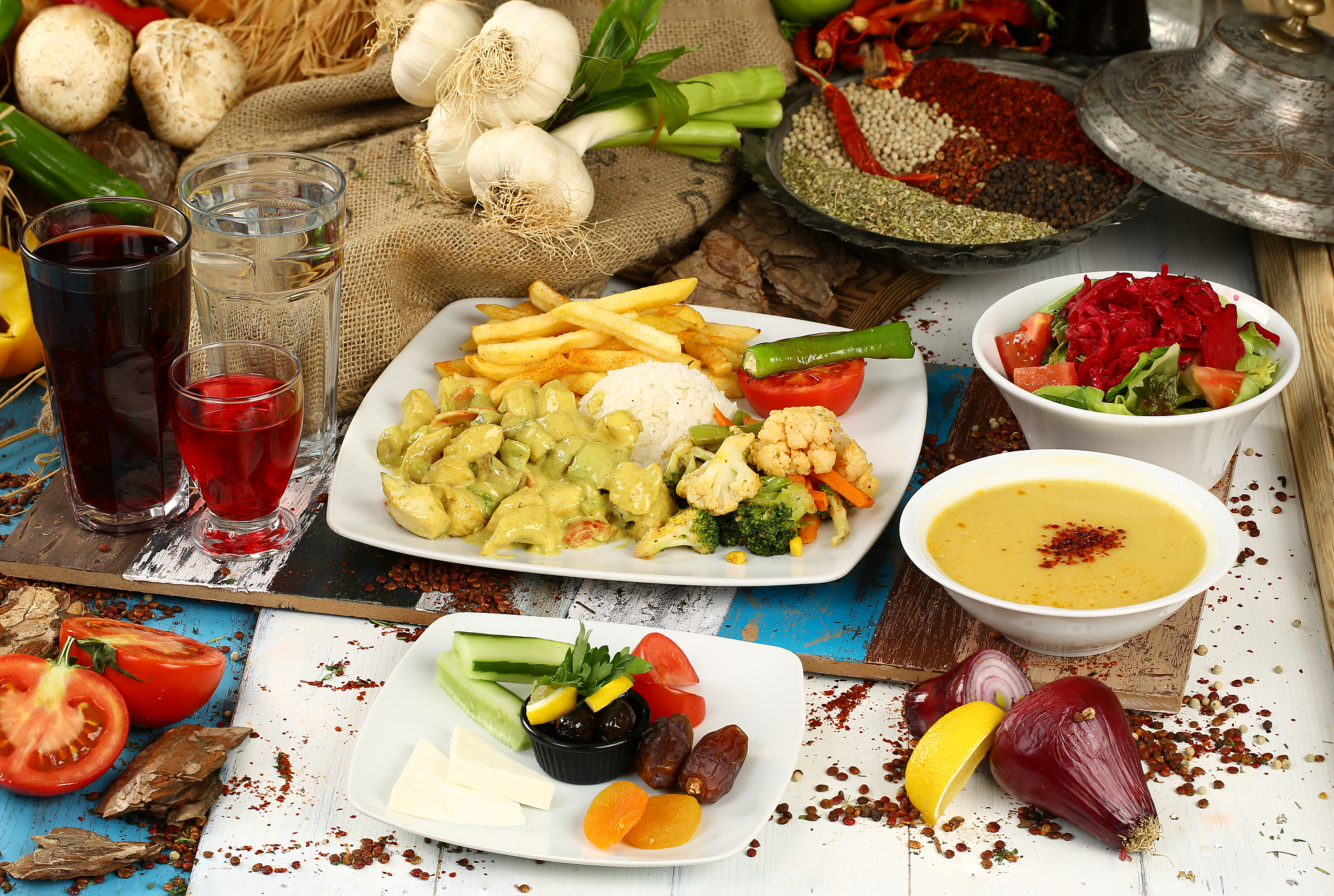 curry of chicken with assorted food
