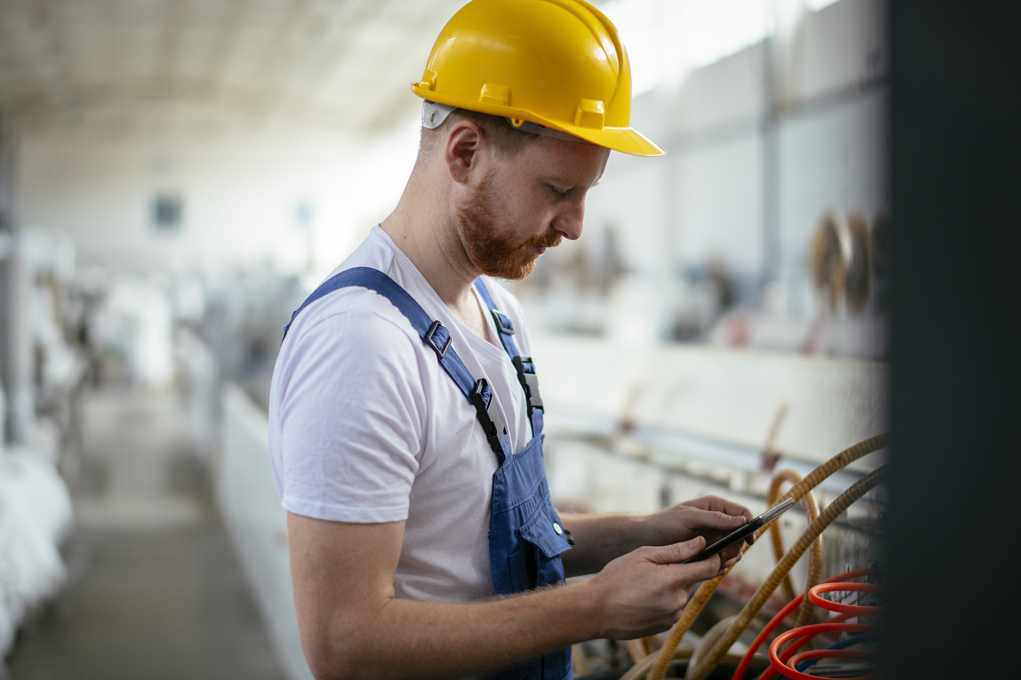 factory worker controlling production