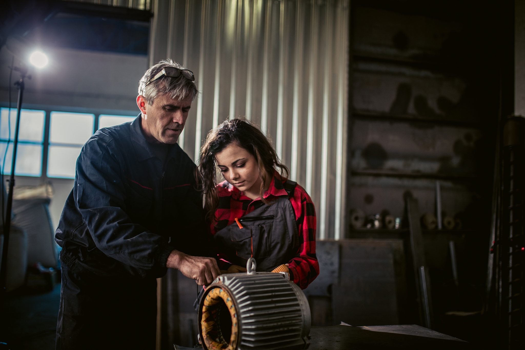 man and young woman mechanic