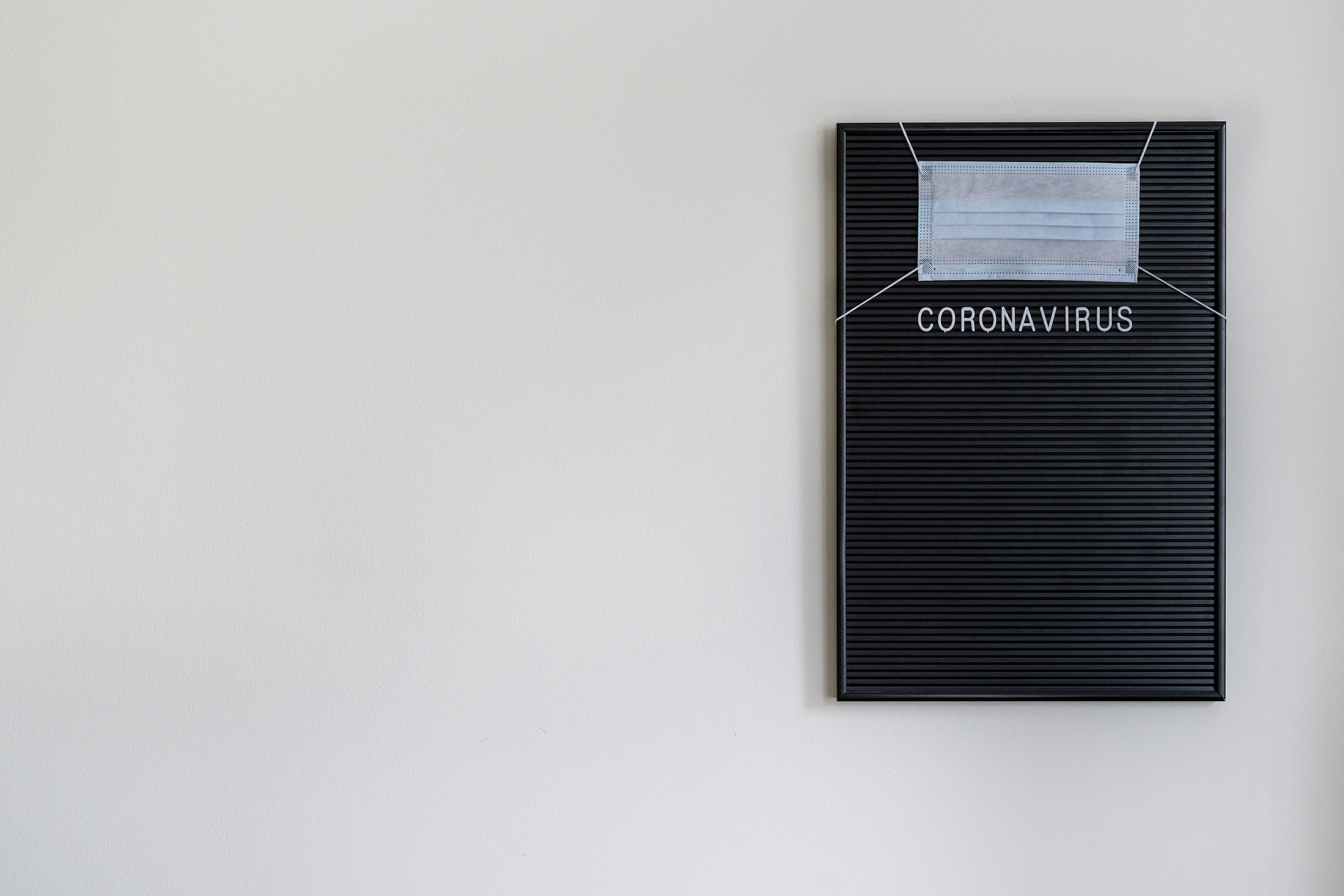 empty blackboard with precaution instructions to pandemic develo