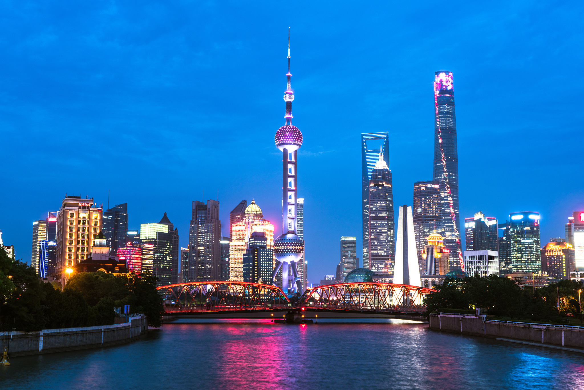 city skyline of shanghai, china, with the iconic buildings - sto