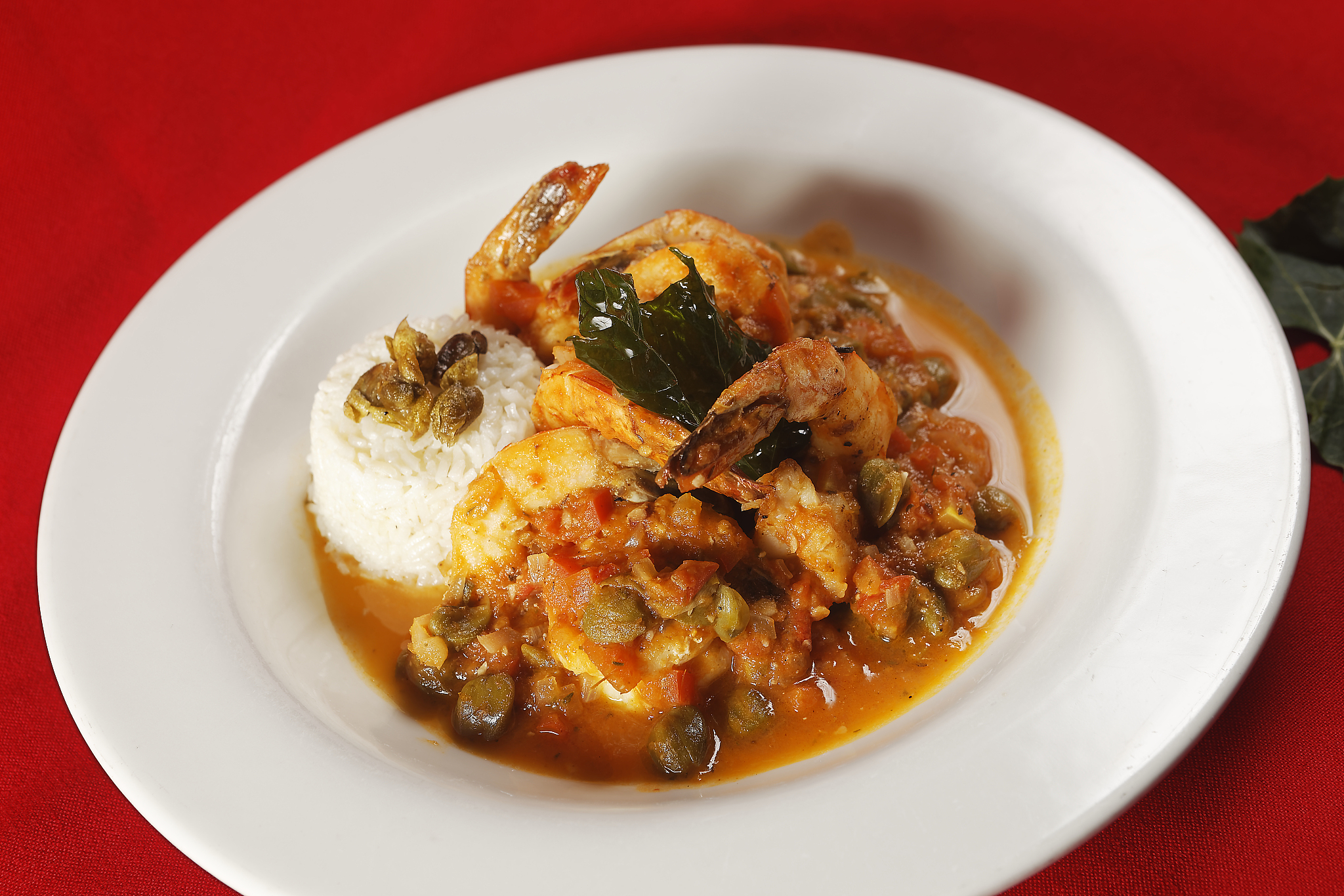 shrimp with caper, chaya leaf and steamed rice.