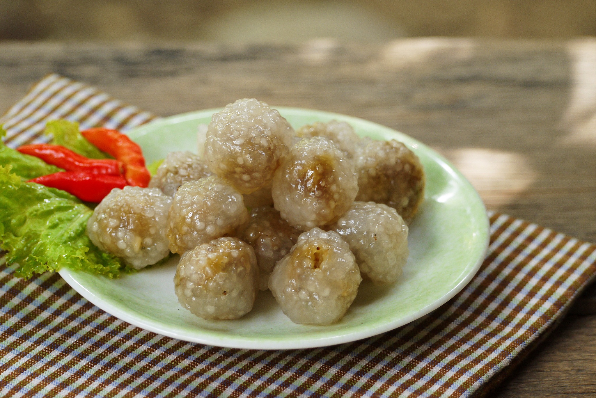 selective focus tapioca balls with pork filling on wooden table 