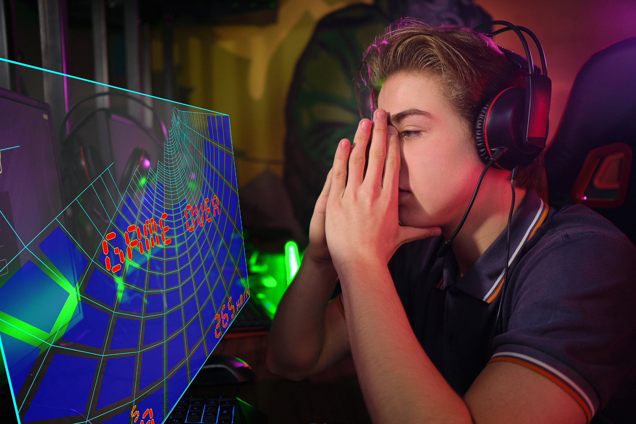 professional young caucasian gamer playing online on his pc. he 