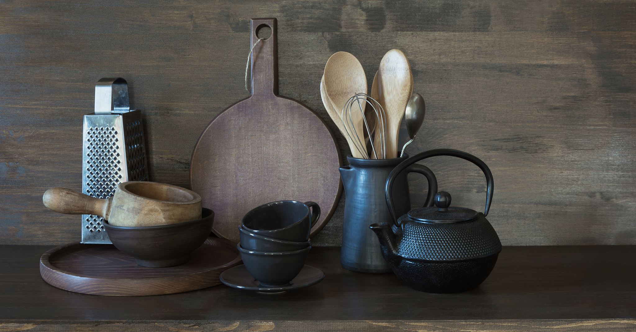 crockery, clayware, dark utensils and other different stuff on w