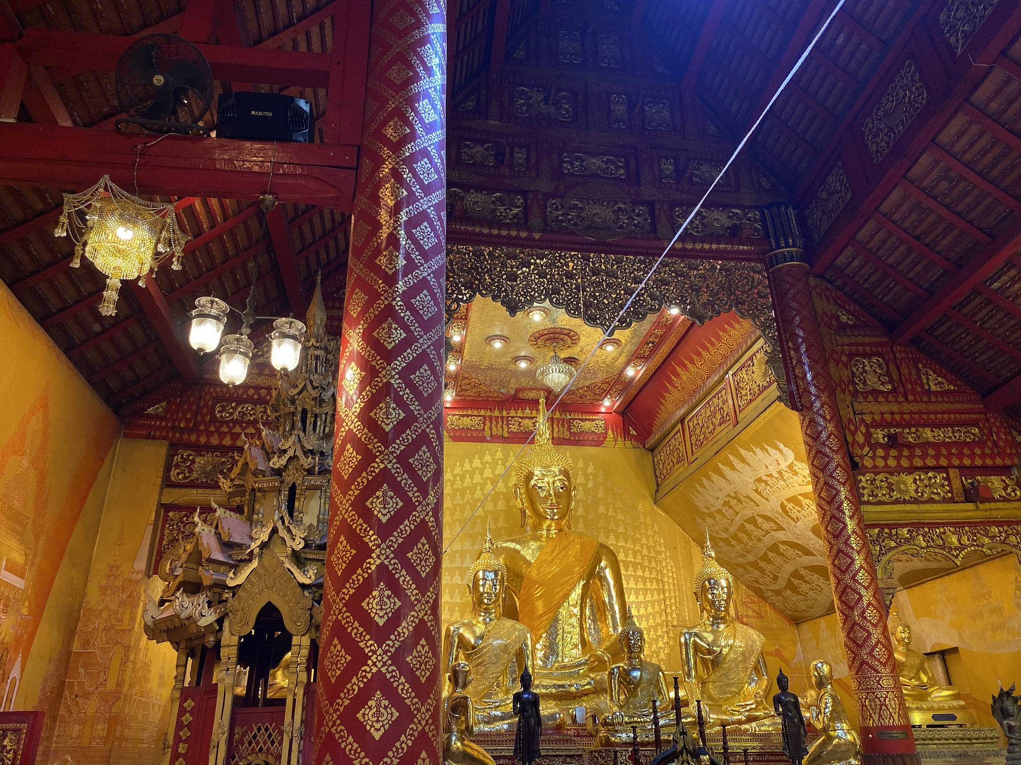 golden buddha image at thai temple