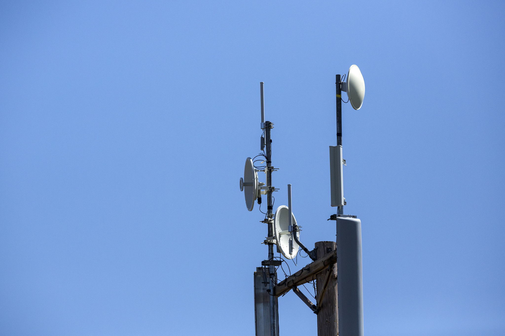 repeater antennas on poles in the country