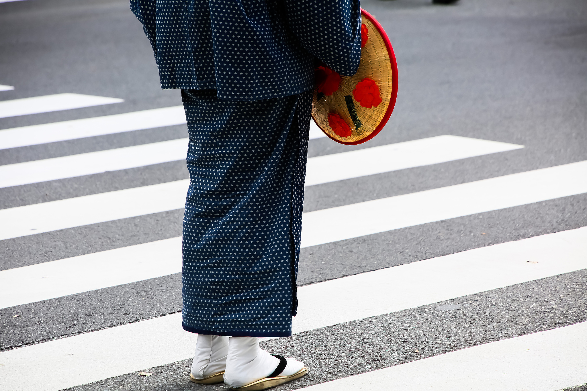 low section of person in traditional clothing standing on road