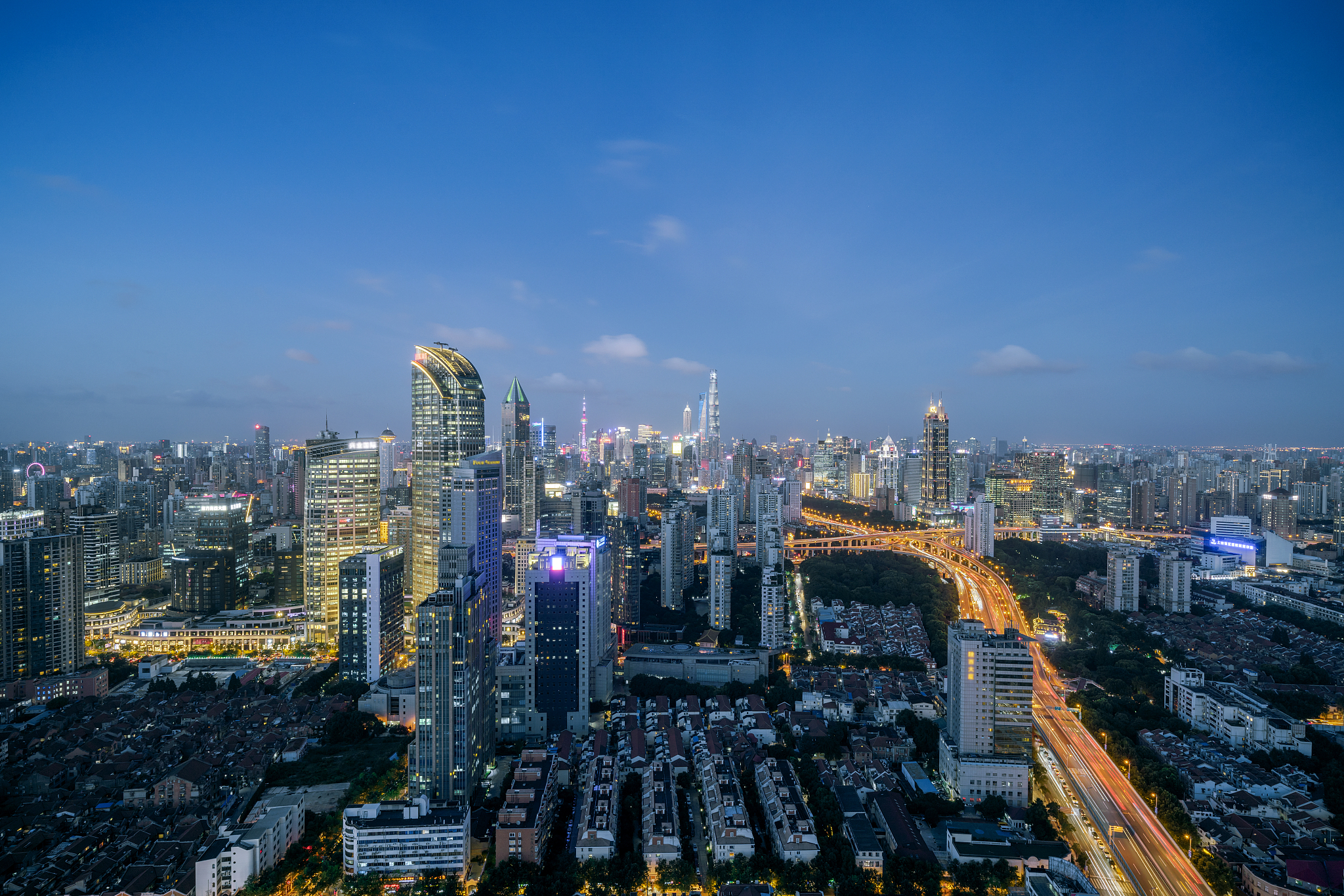 shanghai downtown sunset skyline and viaduct