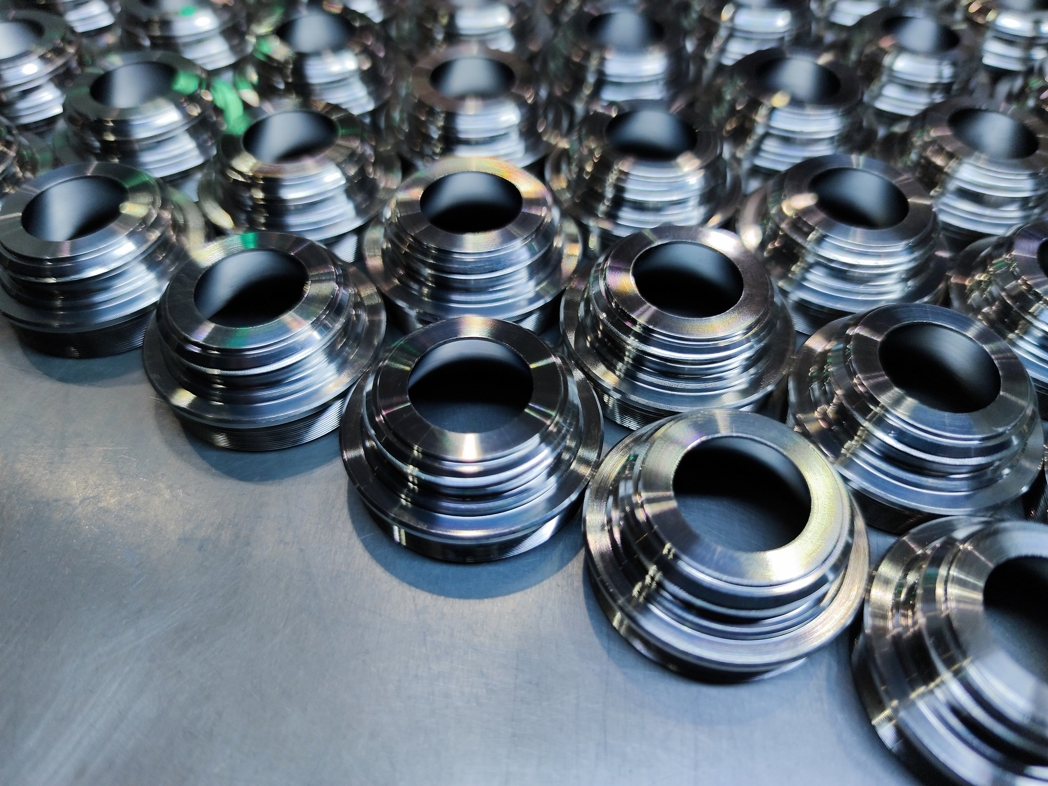 shiny stainless steel parts. an edge of metal cnc turning produc