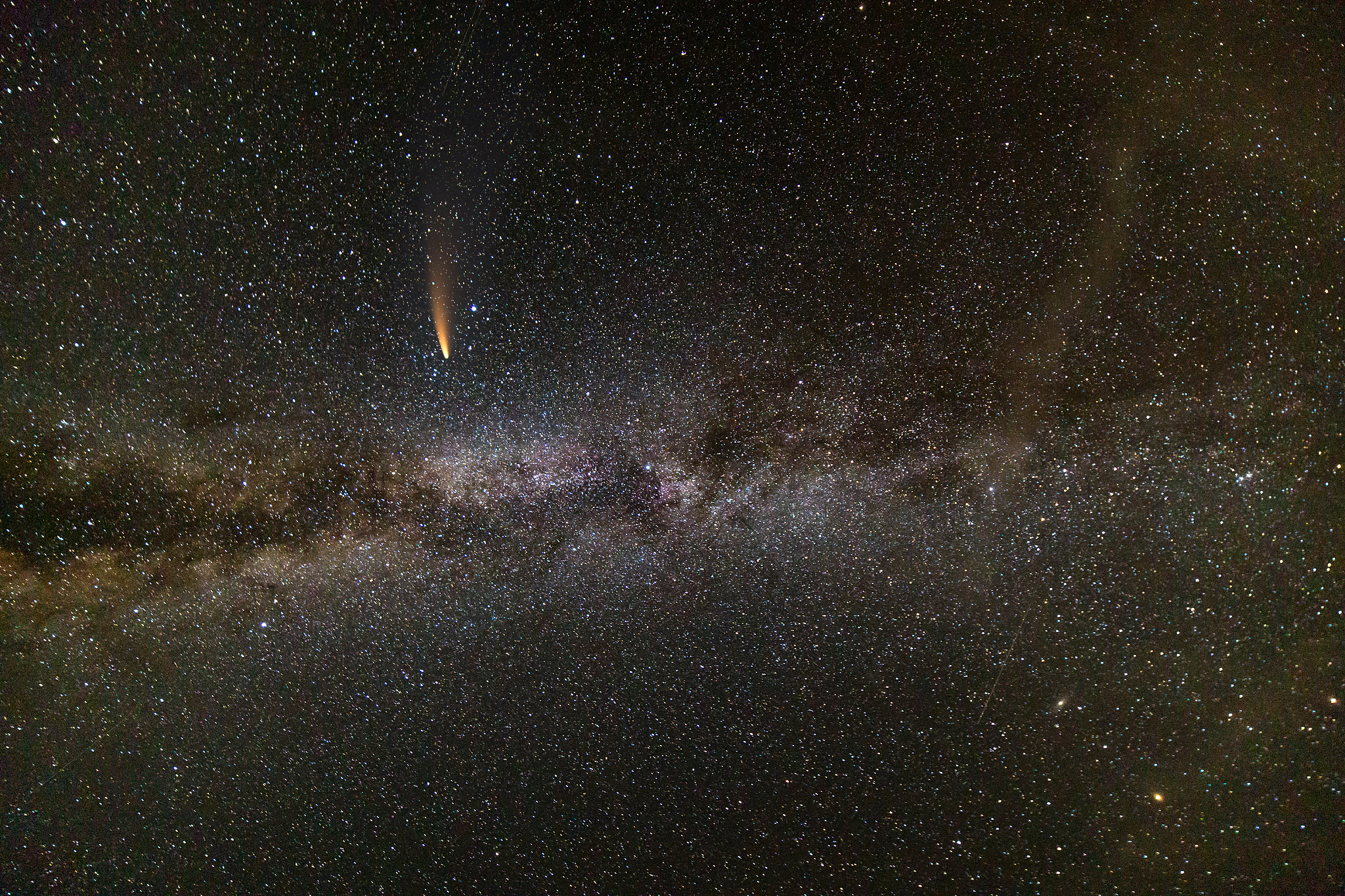 night landscape of milkyway with stars covered sky and neowise c