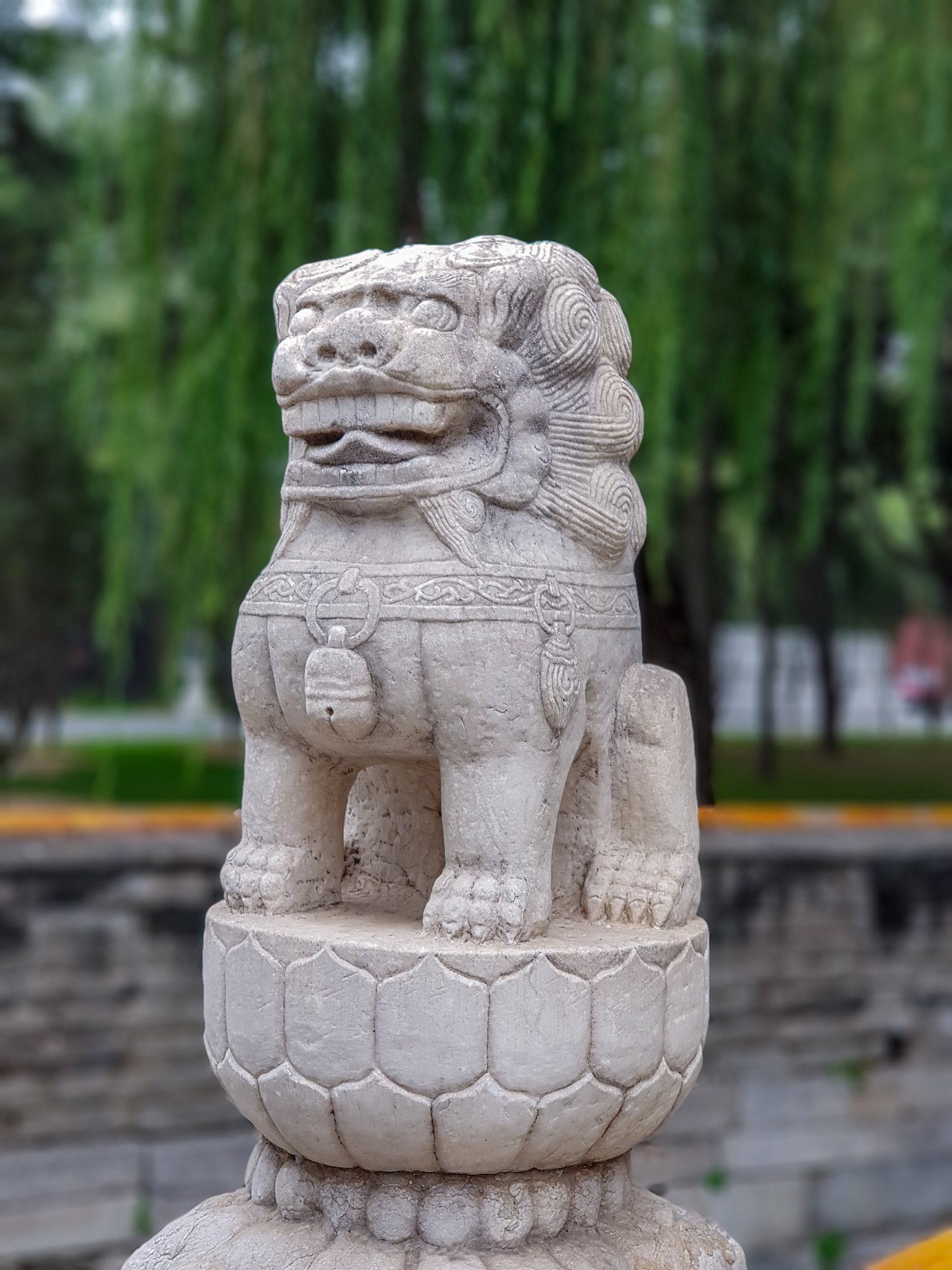 stone guardian lion statue in bridge, forbidden city