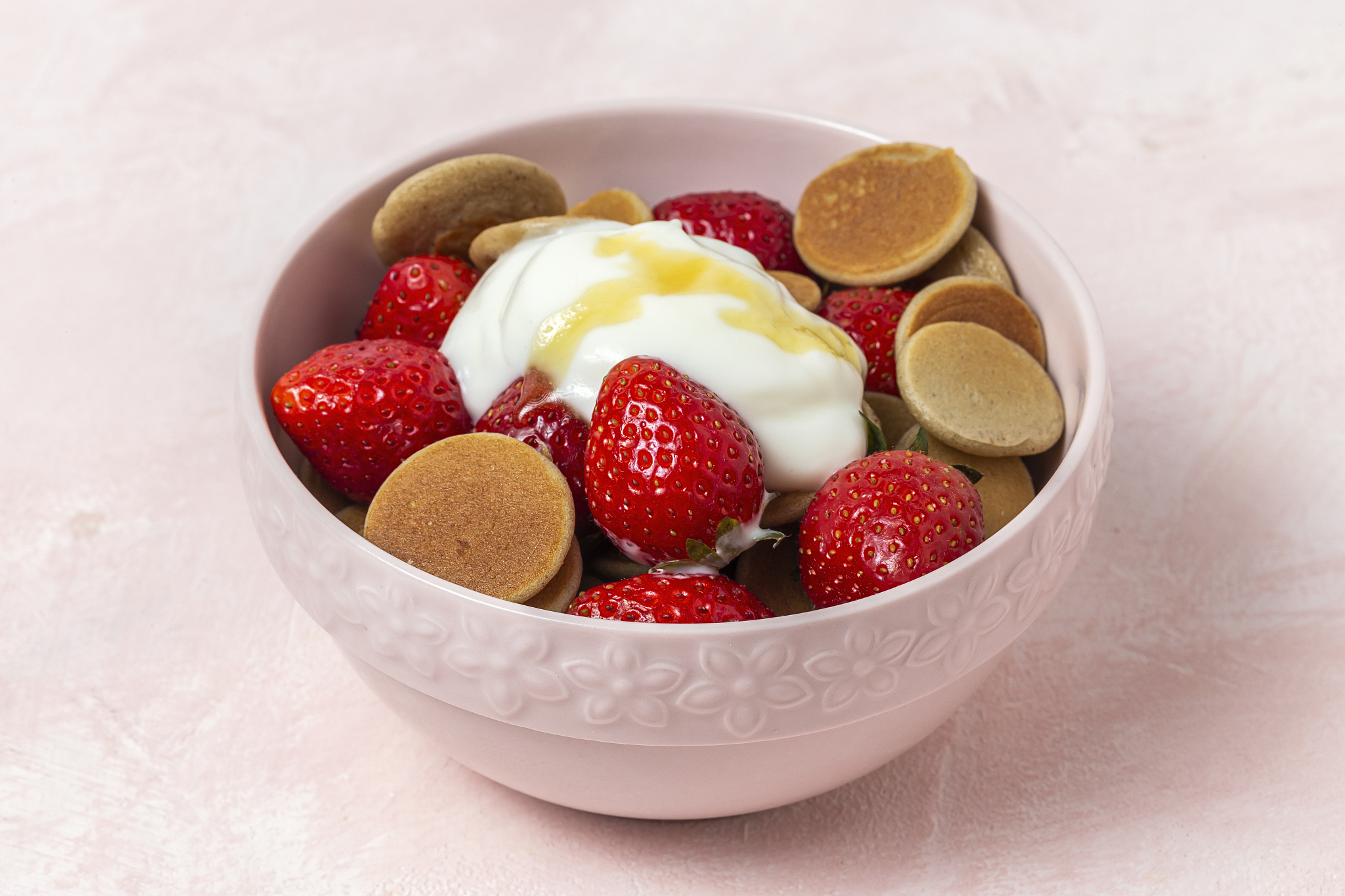 homemade cereals mini pancake with yogurt, honey and strawberrie