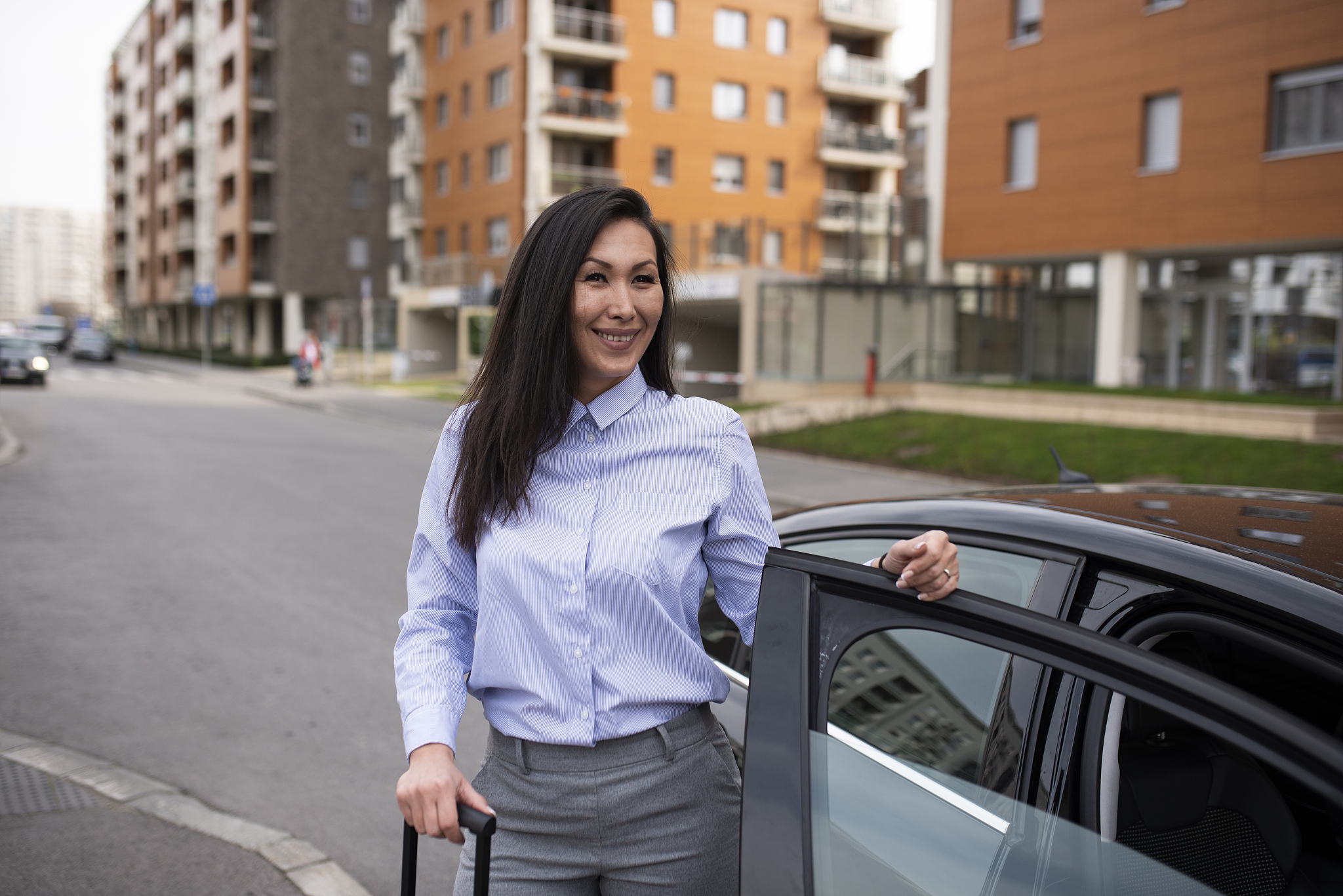 business woman traveling with private luxury car stock photo