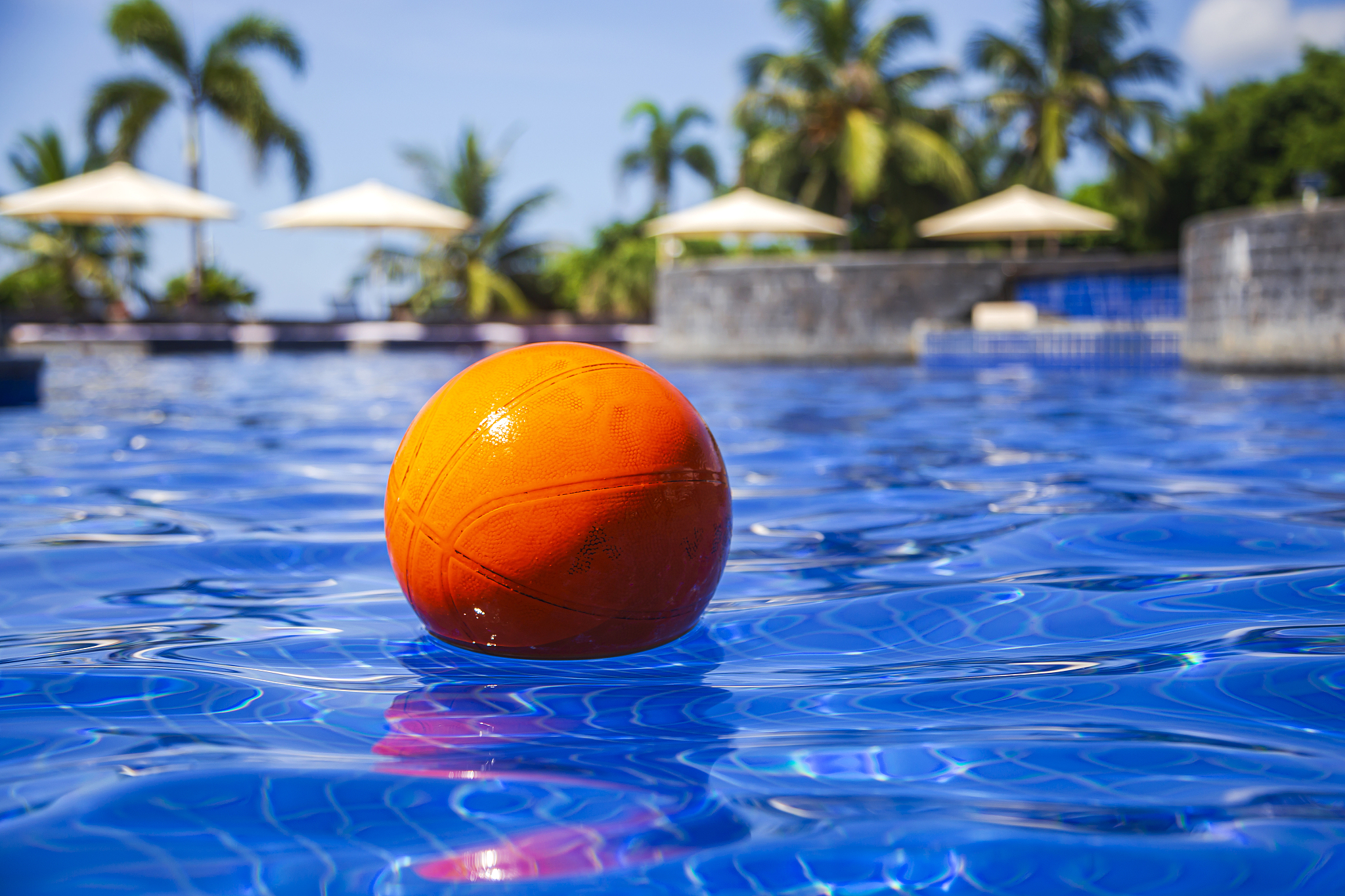 basketball in swimming pool water
