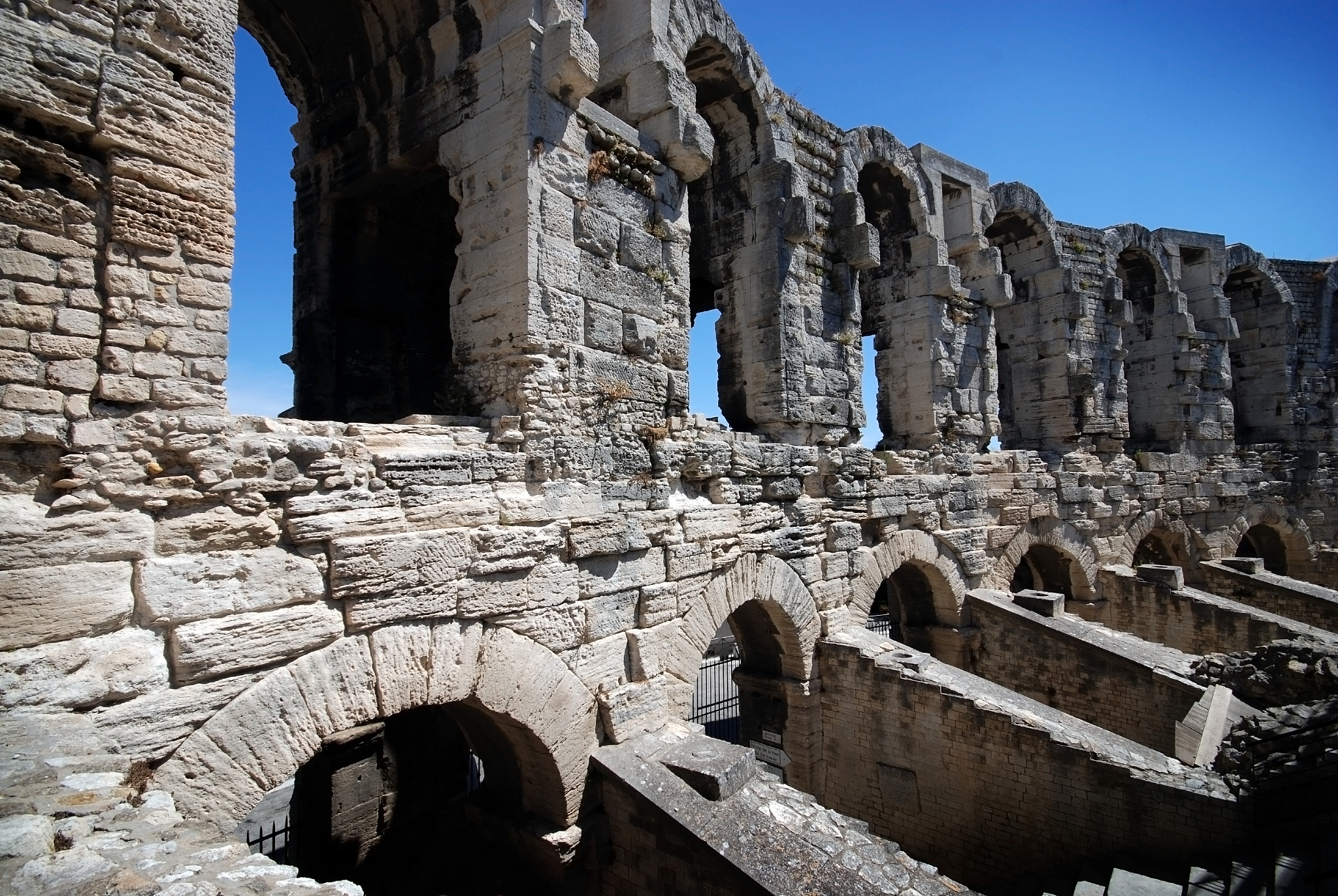 part of inside roman arena in arles, provence, france
